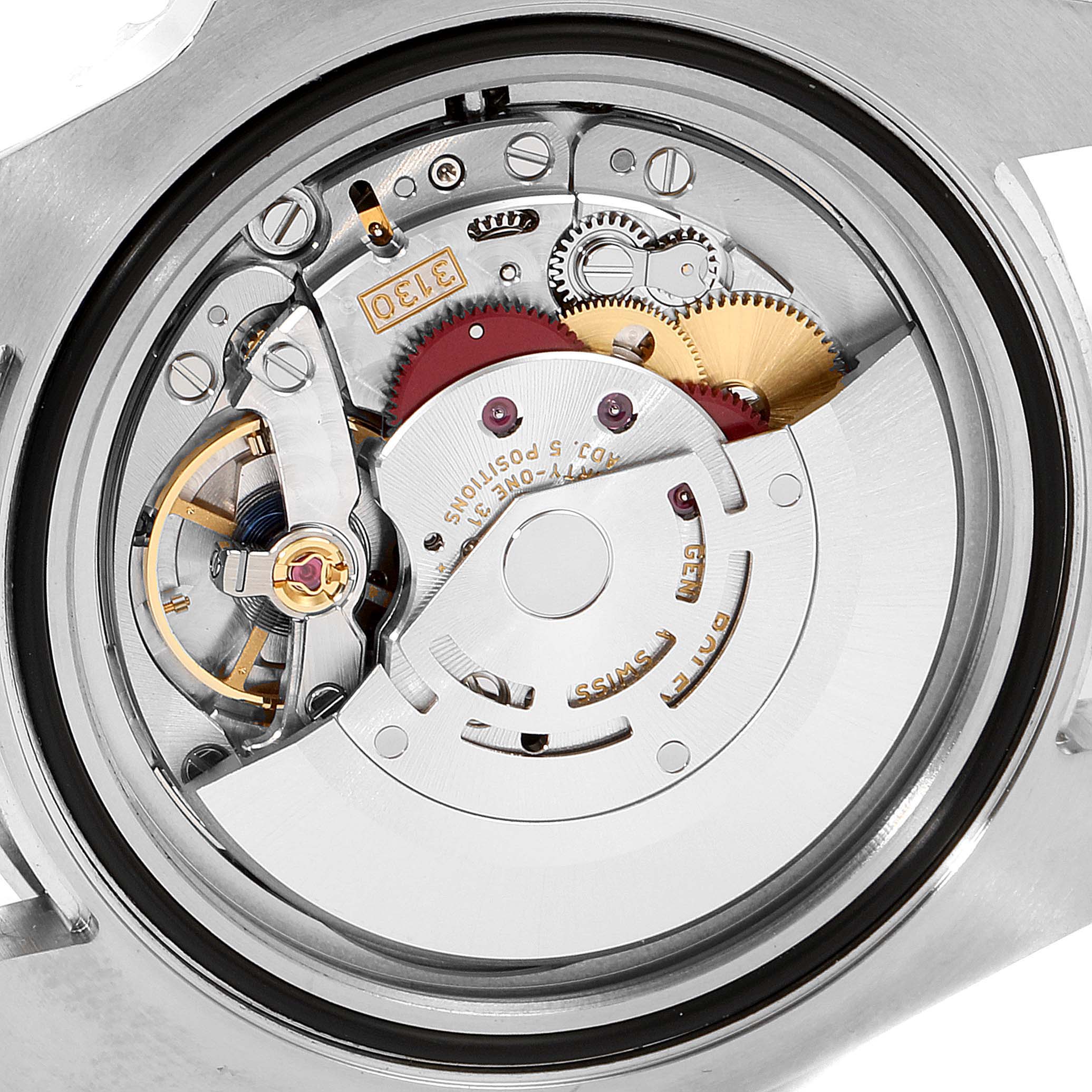 This image shows a close-up of the mechanical movement inside the case of a Rolex Submariner 114060 Men
s Stainless Steel Black Dial 114060 Men
s Stainless Steel Black Dial watch, highlighting gears and components.
