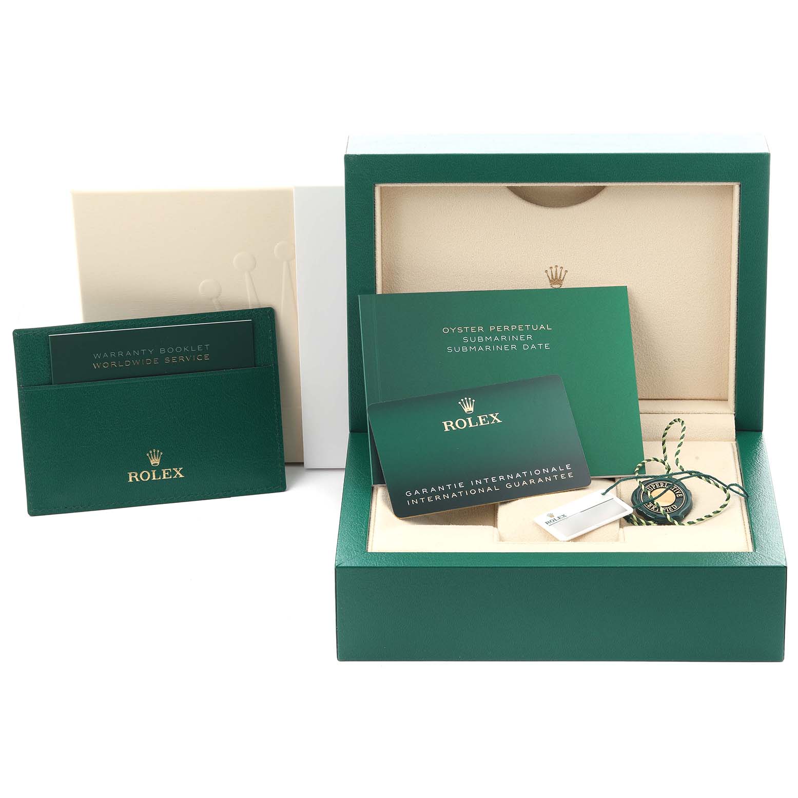 This image shows the packaging and accessories for a Rolex Submariner 126613 Men's Steel and Gold (two tone) Black Dial 126613 Men's Steel and Gold (two tone) Black Dial, including the box, booklet, and tags.
