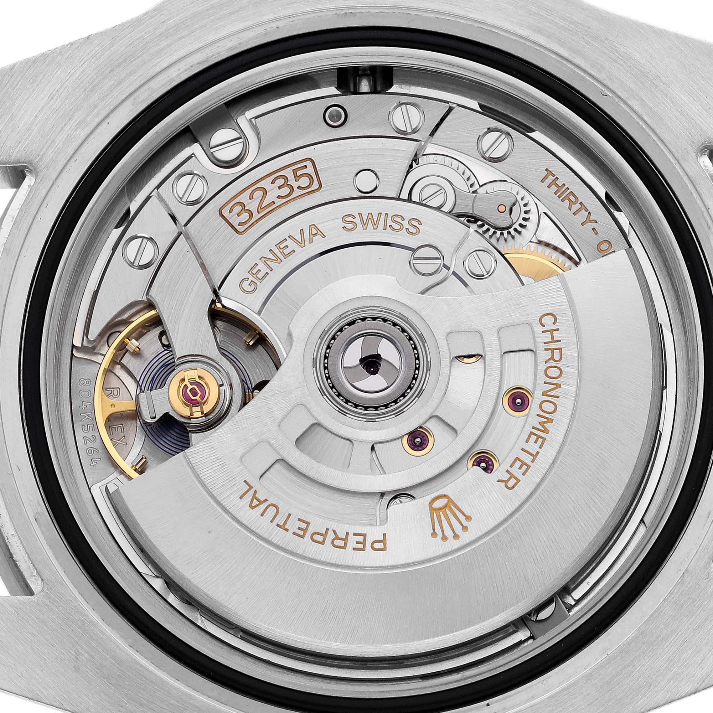 The image shows the movement of the Rolex Submariner 126610LN Men's Stainless Steel Black Dial 126610LN Men's Stainless Steel Black Dial watch, focusing on its intricate internal mechanisms.