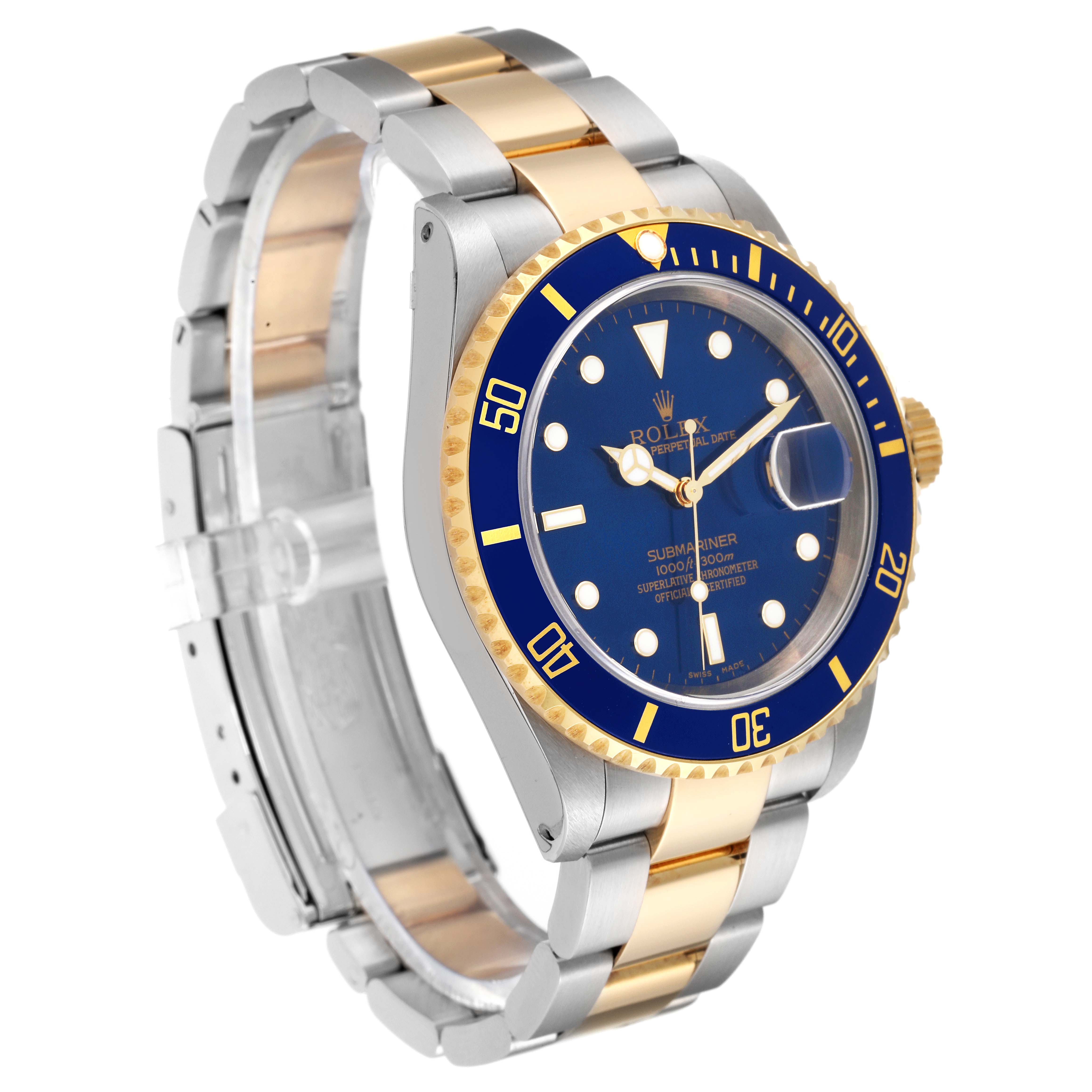 The image shows a Rolex Submariner 16613 Men
s Steel and Gold (two tone) Blue Dial 16613 Men
s Steel and Gold (two tone) Blue Dial watch at a three-quarter angle, highlighting its blue dial, gold bezel, and two-tone bracelet.