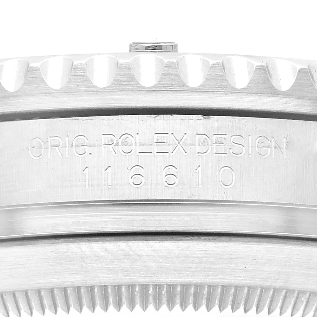 The image shows the side engraving on the case of a Rolex Submariner 116610LV Men
s Stainless Steel Green Dial 116610LV Men
s Stainless Steel Green Dial, model 116610, focusing on the serial inscription.