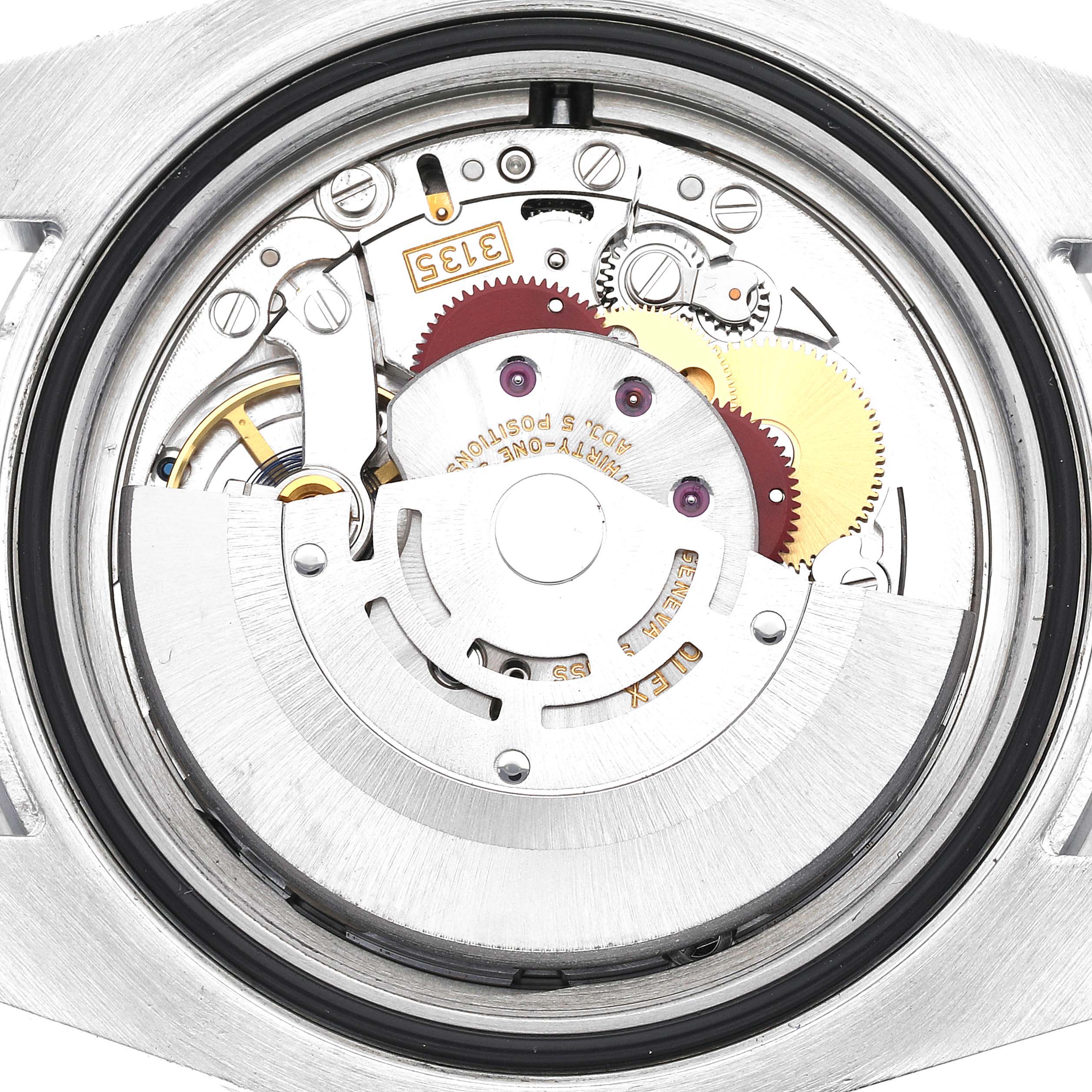 The image shows the internal mechanical movement of a Rolex Submariner 116610LV Men
s Stainless Steel Green Dial 116610LV Men
s Stainless Steel Green Dial watch from a close-up, rear angle.