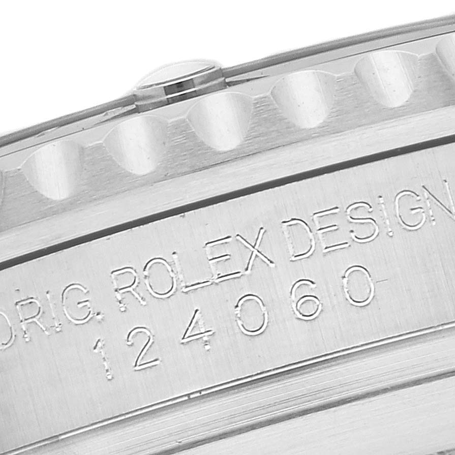 This is a close-up of the case back and bezel edge of a Rolex Submariner 124060 Men
s Stainless Steel Black Dial 124060 Men
s Stainless Steel Black Dial, showing the model number and engraving.