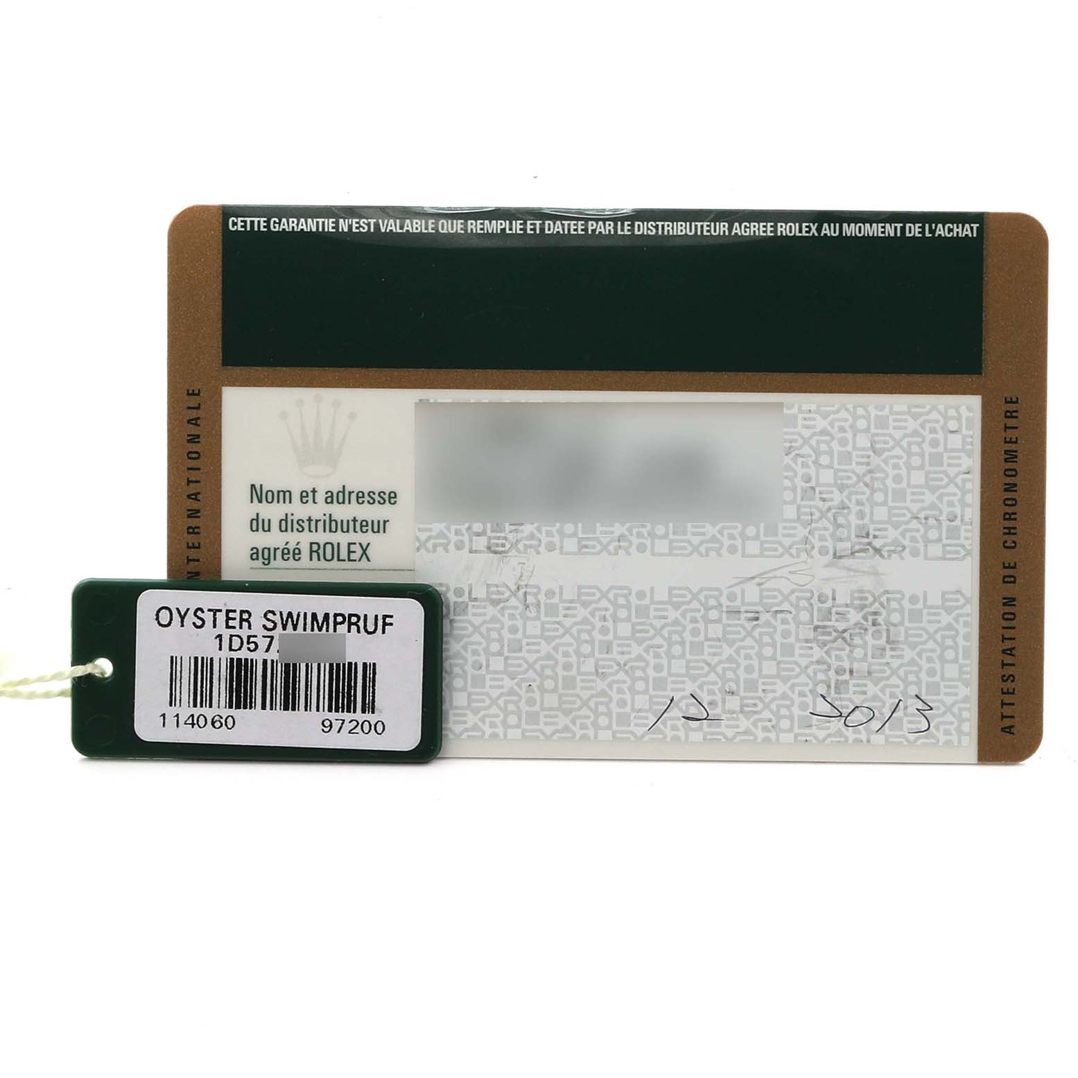 The image shows a Rolex Submariner 114060 Men's Stainless Steel Black Dial 114060 Men's Stainless Steel Black Dial warranty card and an Oyster Swimpruf tag.