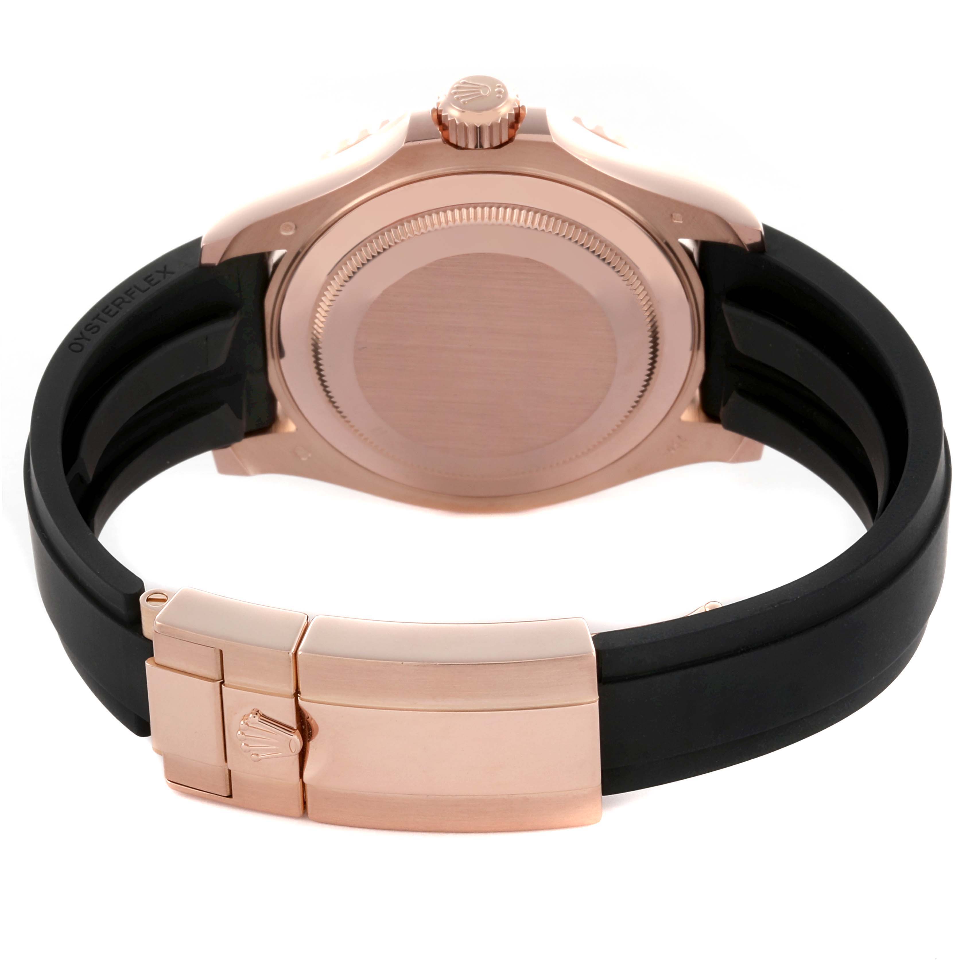 The Rolex Yacht-Master 116655 Men's Rose Gold Black Dial 116655 Men's Rose Gold Black Dial watch is shown from the back, highlighting the case back, crown, and clasp of the strap.
