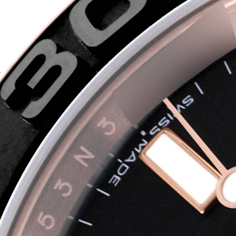 The image shows a close-up of the dial and bezel of a Rolex Yacht-Master 116655 Men's Rose Gold Black Dial 116655 Men's Rose Gold Black Dial watch, displaying numerals and part of the face.
