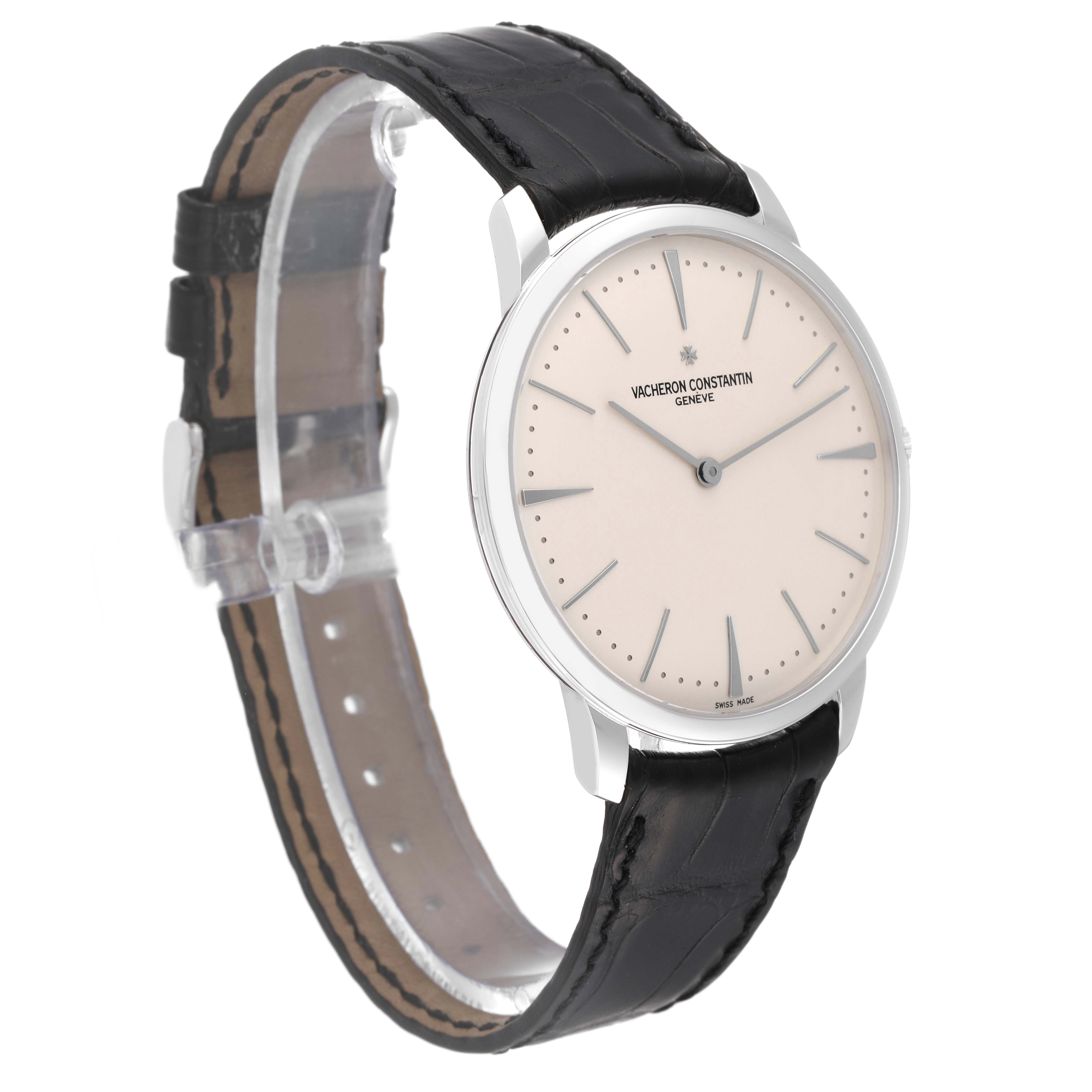 The Vacheron Constantin Patrimony 81180/000G Men's White Gold Silver Dial 81180/000G Men's White Gold Silver Dial watch is shown at a three-quarter angle, displaying the face, case, and black leather strap.