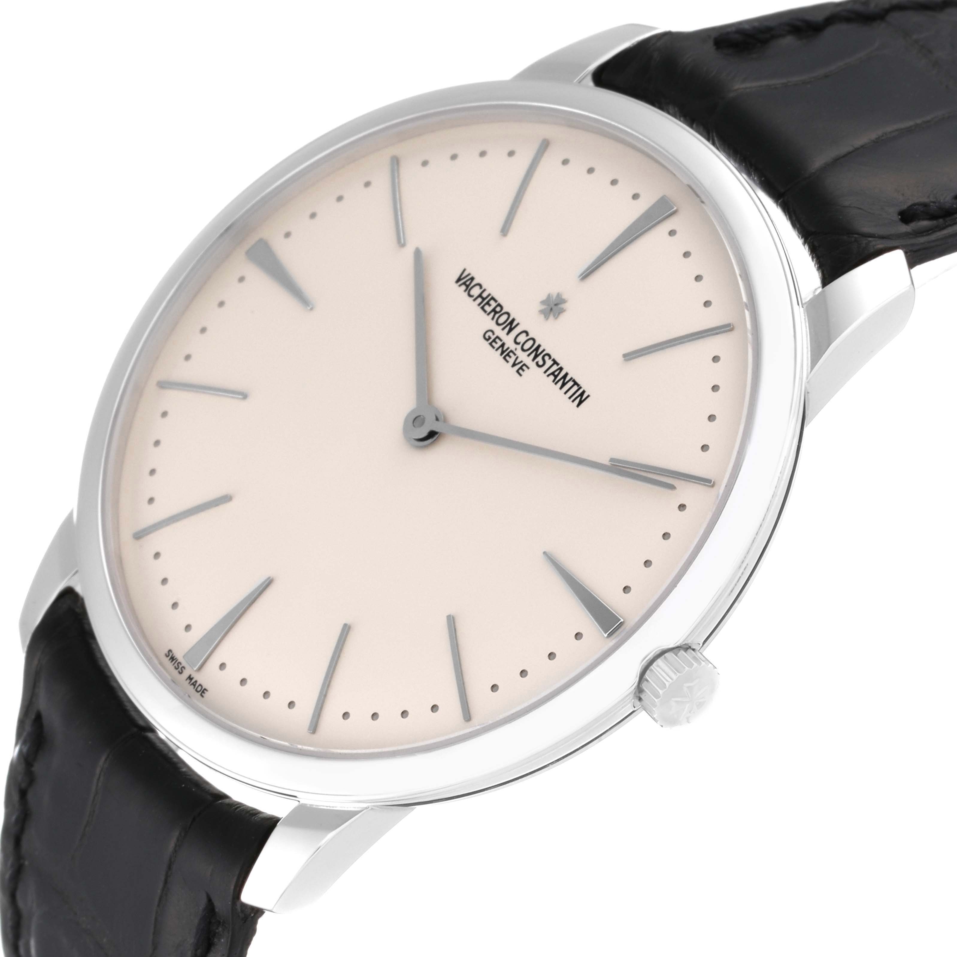 The image shows a Vacheron Constantin Patrimony 81180/000G Men's White Gold Silver Dial 81180/000G Men's White Gold Silver Dial watch at a slight angle, highlighting its face, markers, hands, bezel, crown, and strap.