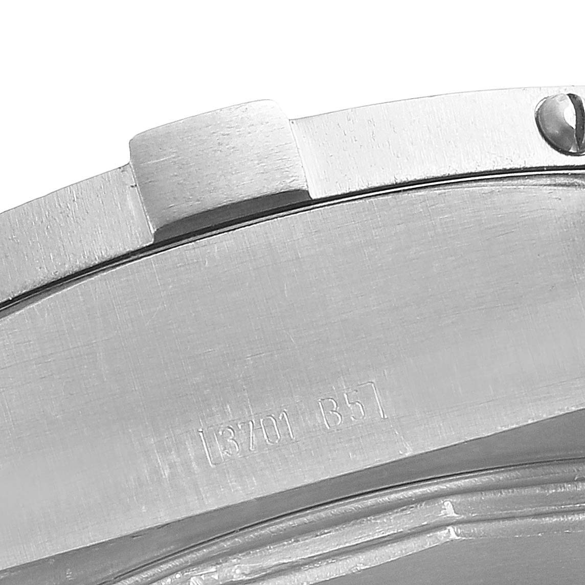 This image shows a close-up of the side of the bezel and part of the case of a Breitling Avenger E13360 Men's Titanium Blue Dial E13360 Men's Titanium Blue Dial watch.