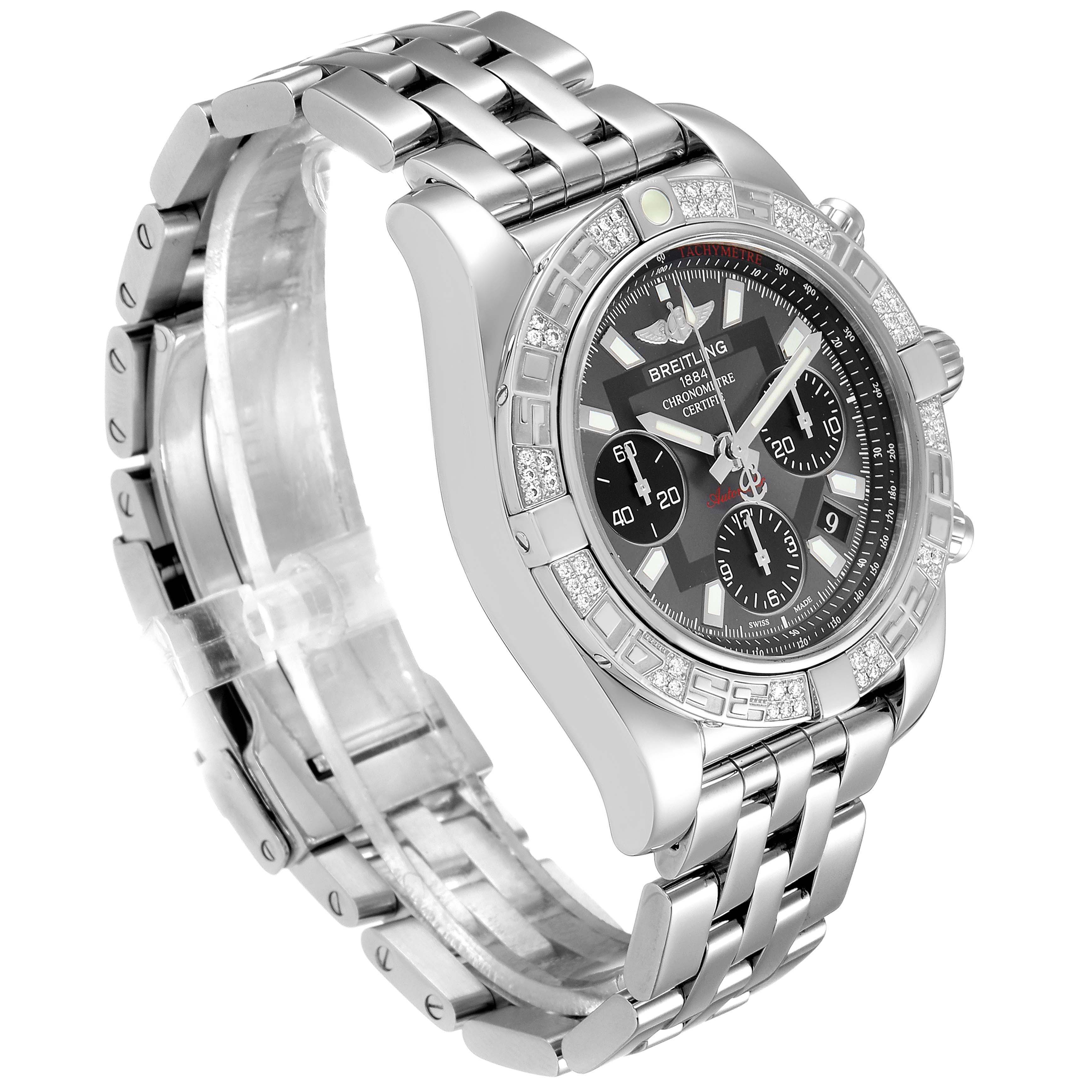 The image shows a side-angle view of a Breitling Chronomat AB0140 Men's Stainless Steel Grey Dial AB0140 Men's Stainless Steel Grey Dial watch with a stainless steel bracelet and diamond bezel.