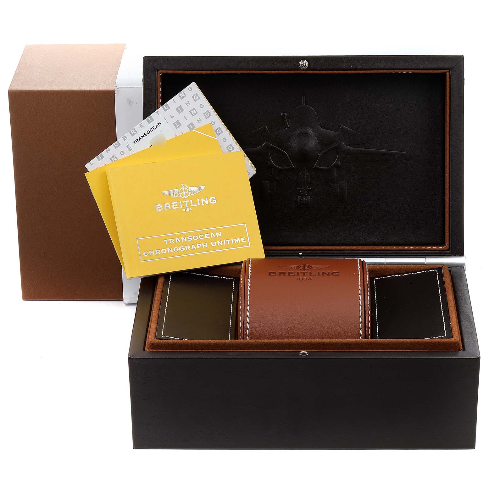 The image shows the accessory box for the Breitling Transocean RB0510U4-BB63BKLD Men's Rose Gold Black Dial RB0510U4-BB63BKLD Men's Rose Gold Black Dial model with the manual and a brown leather watch holder.