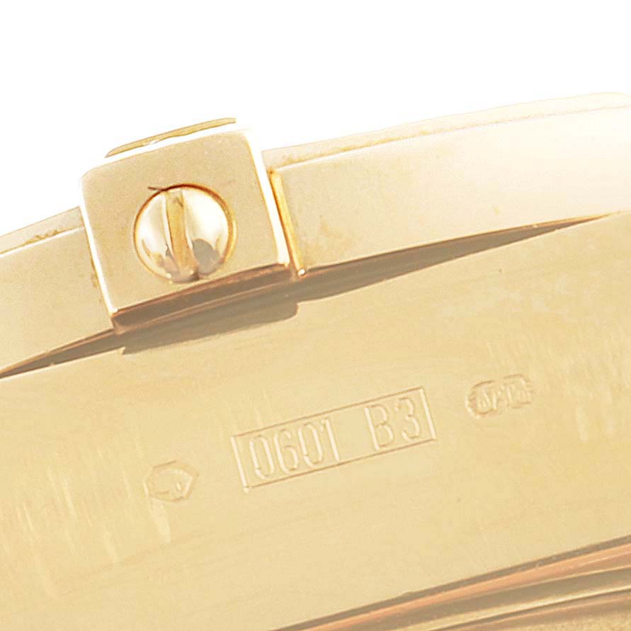 The image shows a close-up of the clasp mechanism on a Breitling Windrider K45355 Men's Yellow Gold Black Dial K45355 Men's Yellow Gold Black Dial watch.