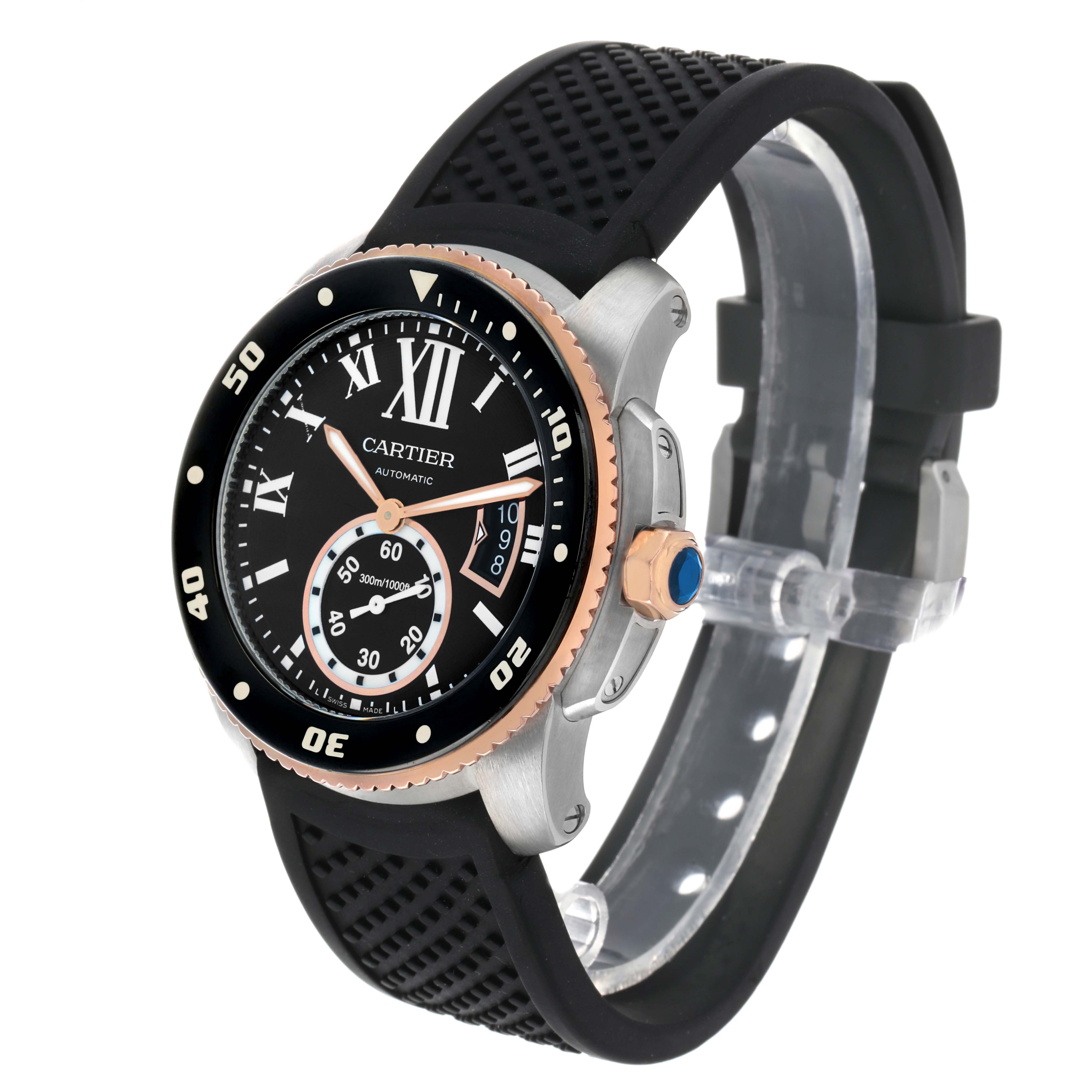 The Calibre de Cartier watch is shown at a slight angle, highlighting the face, bezel, crown, and part of the strap.