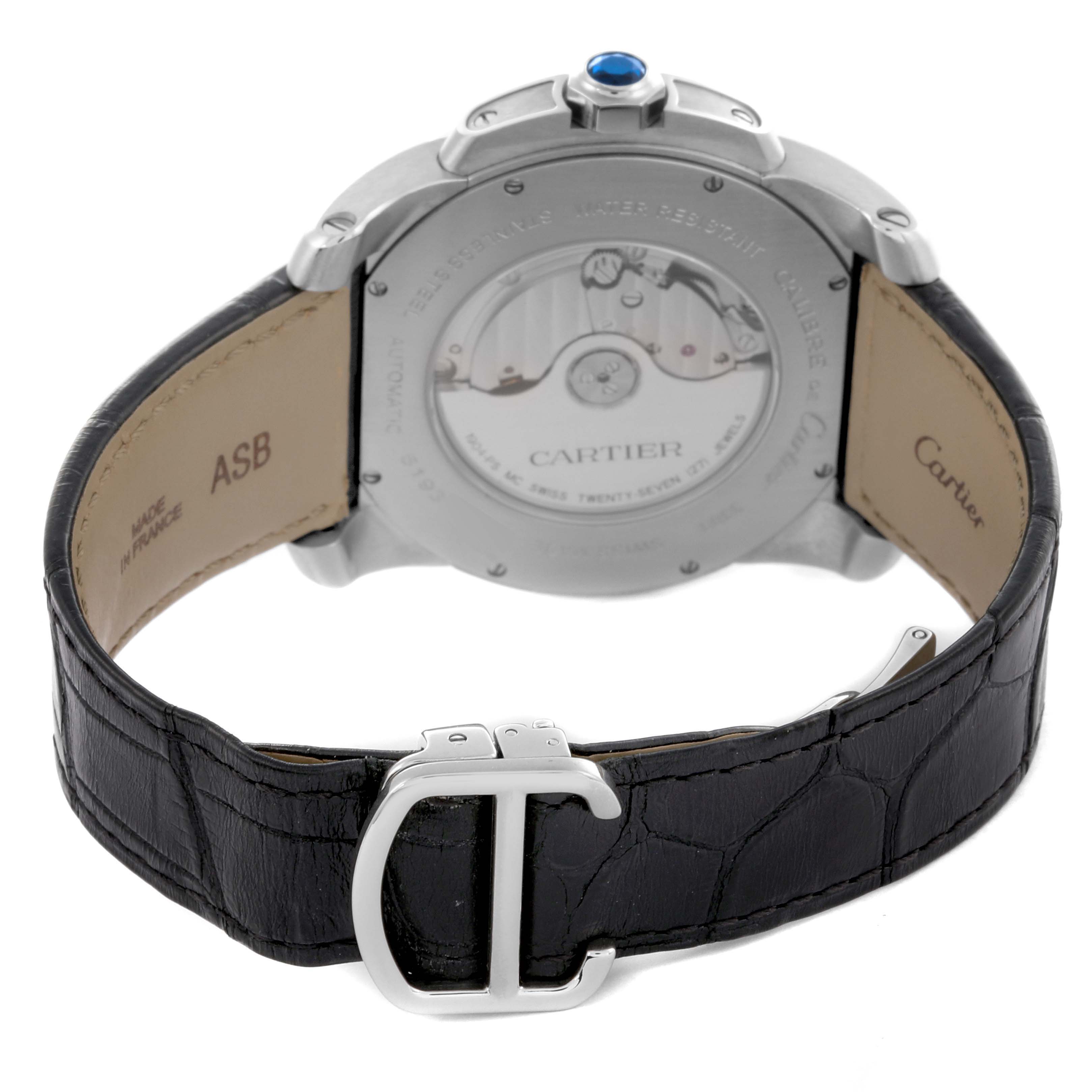The image shows the back view of a Calibre de Cartier watch by Cartier, highlighting the case back and leather strap.