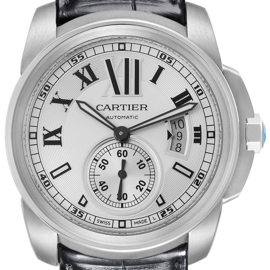 The Calibre de Cartier watch is shown from a front angle, displaying its dial, hands, and date window.