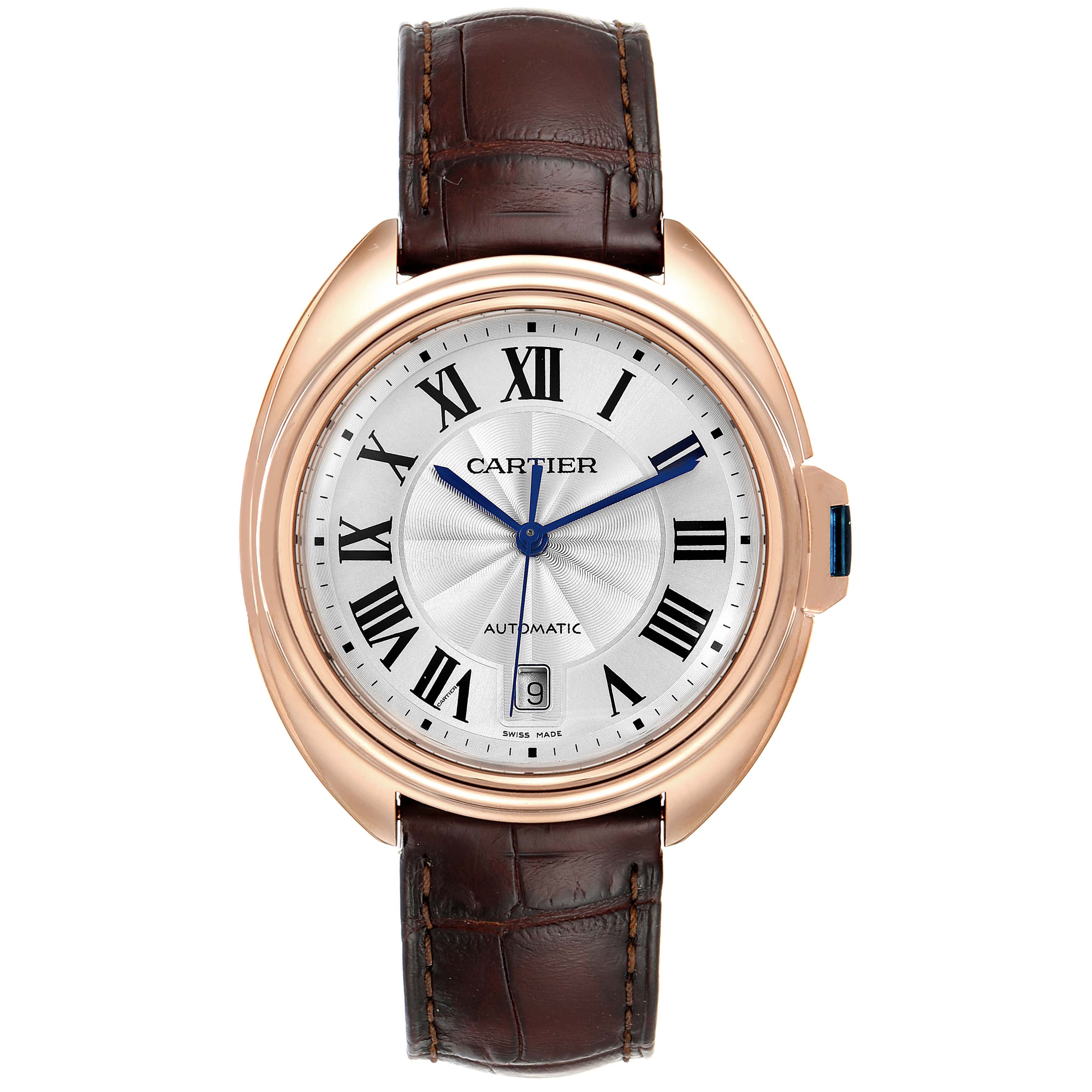 This image shows a front view of the Cartier Clé model watch, featuring its brown leather strap, dial with Roman numerals, and date display.