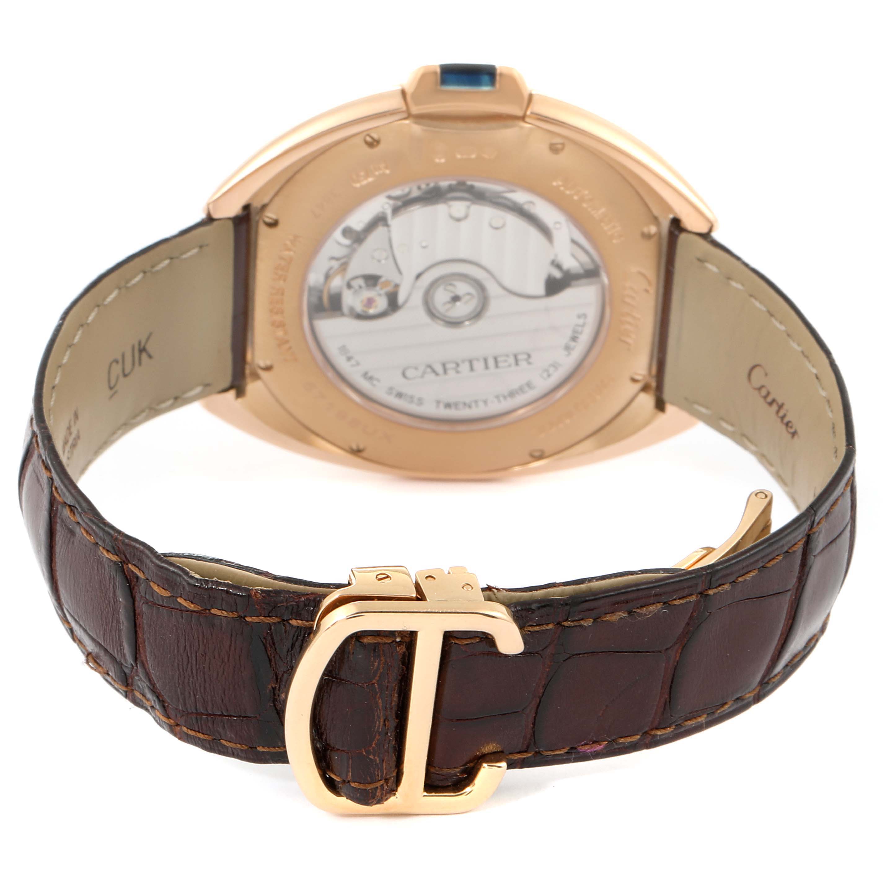 The image shows the back view of a Cartier Cle WGCL0004 Men's Rose Gold Silver Dial WGCL0004 Men's Rose Gold Silver Dial model watch, highlighting the leather strap and visible mechanical movement.