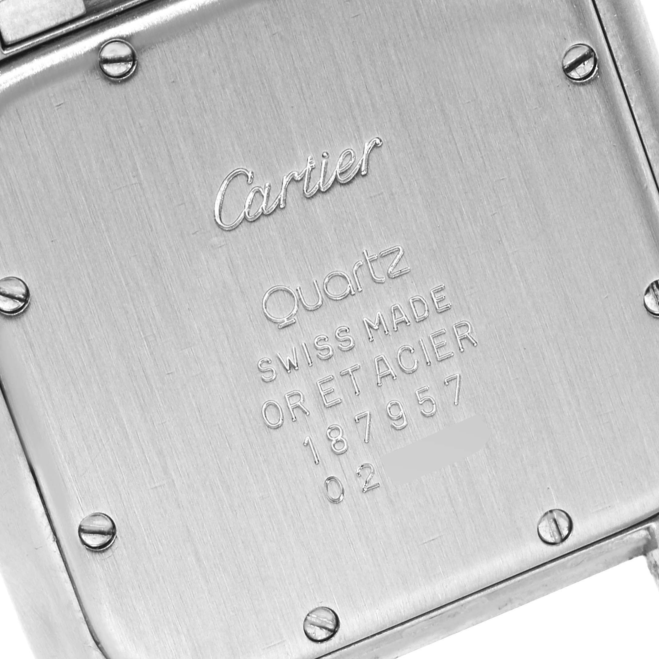 This image shows the engraved case back of a Cartier Panthere 187957 Men's Steel and Gold (two tone) Silver Dial 187957 Men's Steel and Gold (two tone) Silver Dial watch, displaying its model, material, and serial number.