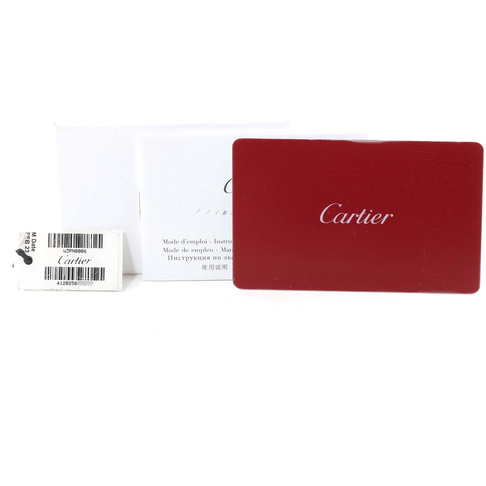 The image shows the instruction manual, a tag, and a red Cartier authenticity card for the Cartier Panthere W3PN0006 Women's Steel and Gold (two tone) Silver Dial W3PN0006 Women's Steel and Gold (two tone) Silver Dial model.