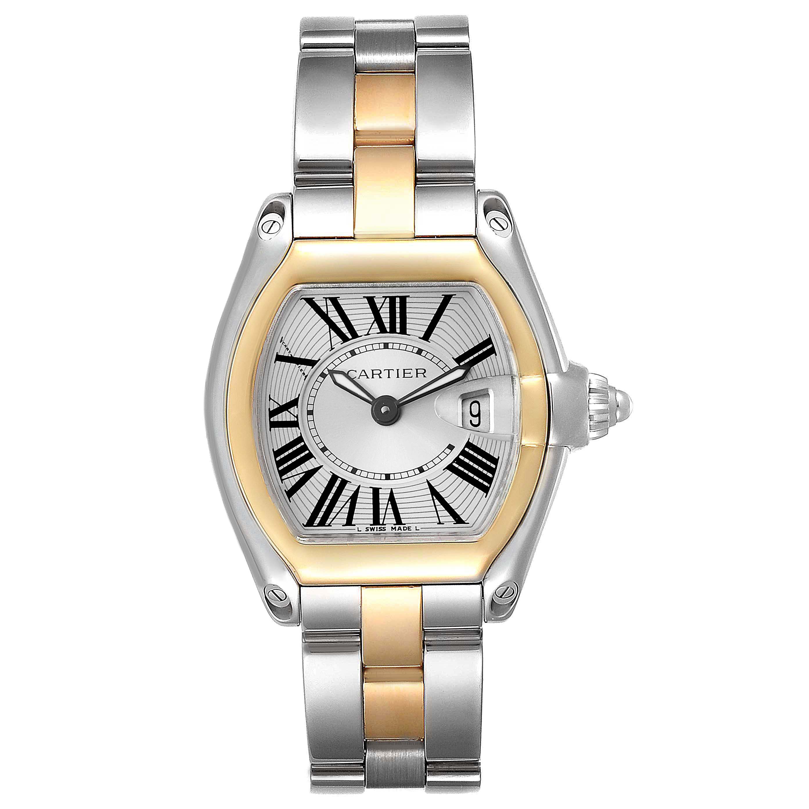 The image shows a Cartier Roadster W62026Y4 Women's Steel and Gold (two tone) Silver Dial W62026Y4 Women's Steel and Gold (two tone) Silver Dial watch from a top view, highlighting its metal bracelet, Roman numeral face, and date display.