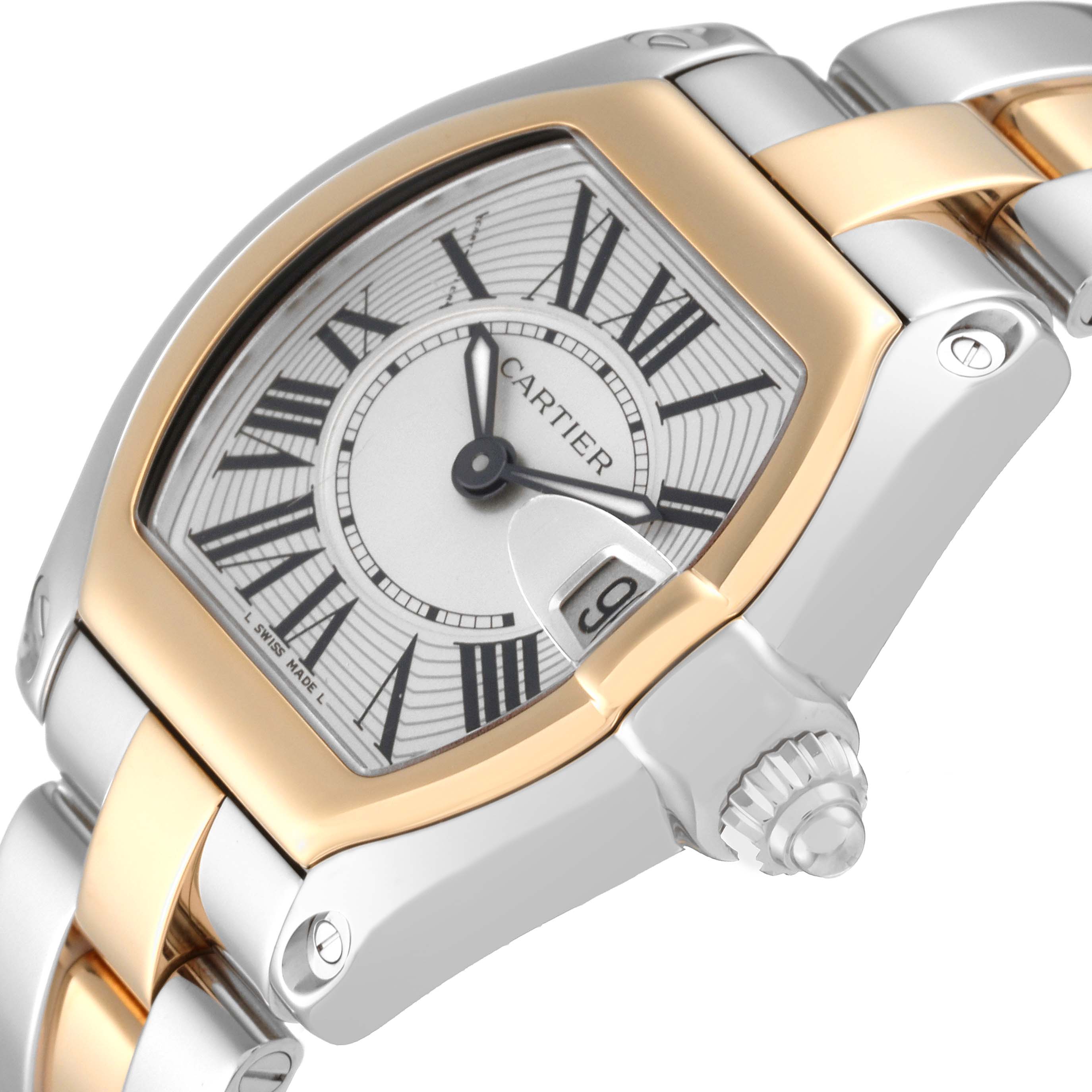 The image shows a close-up of the Cartier Roadster W62026Y4 Women's Steel and Gold (two tone) Silver Dial W62026Y4 Women's Steel and Gold (two tone) Silver Dial watch face, crown, bezel, and part of the bracelet.