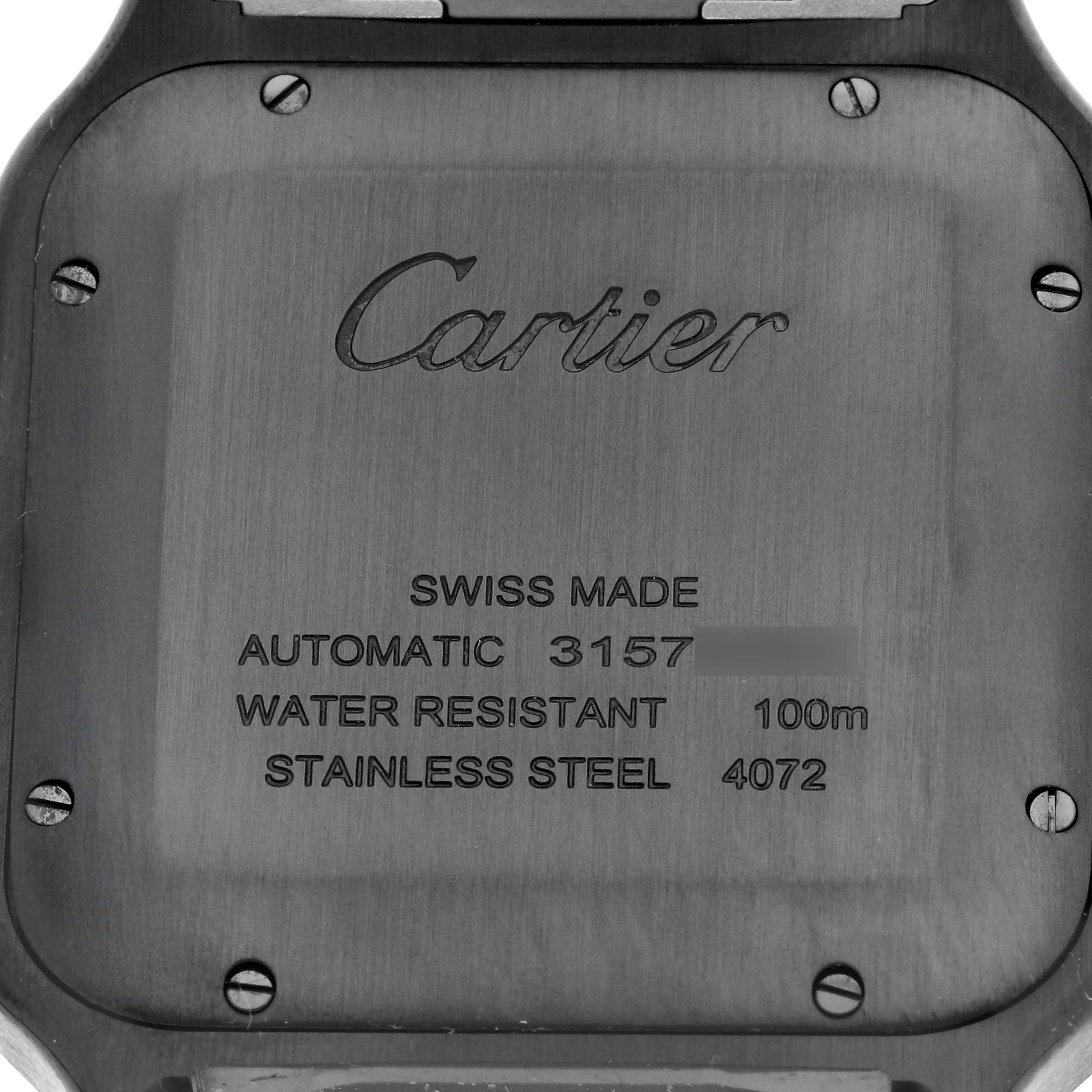 The image shows the back case of a Cartier Santos Dumont WSSA0039 Men's Stainless Steel Black Dial watch, featuring details like water resistance and material specifications.