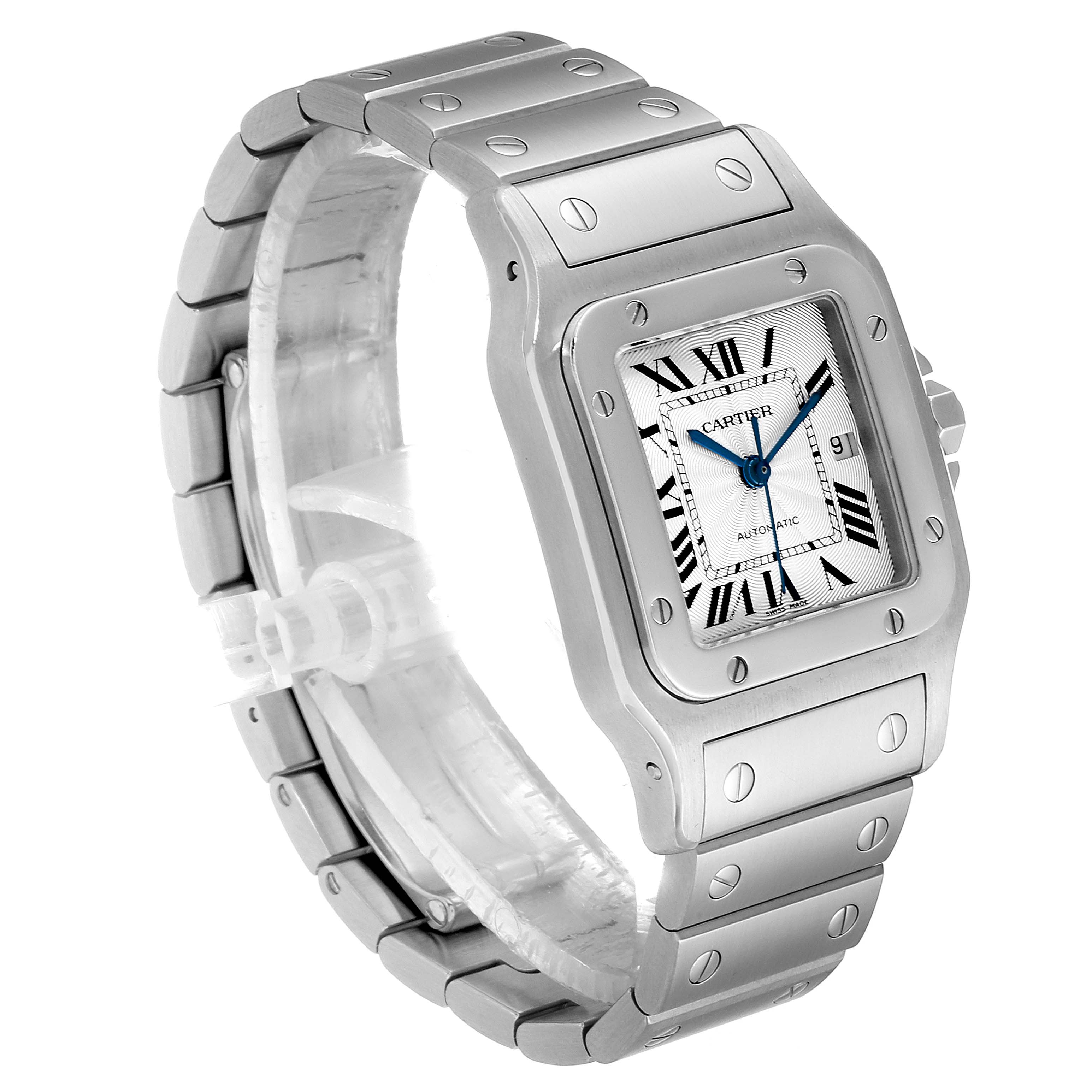 The image shows a Santos model watch by Cartier at a three-quarter angle displaying the face, strap, and bezel.