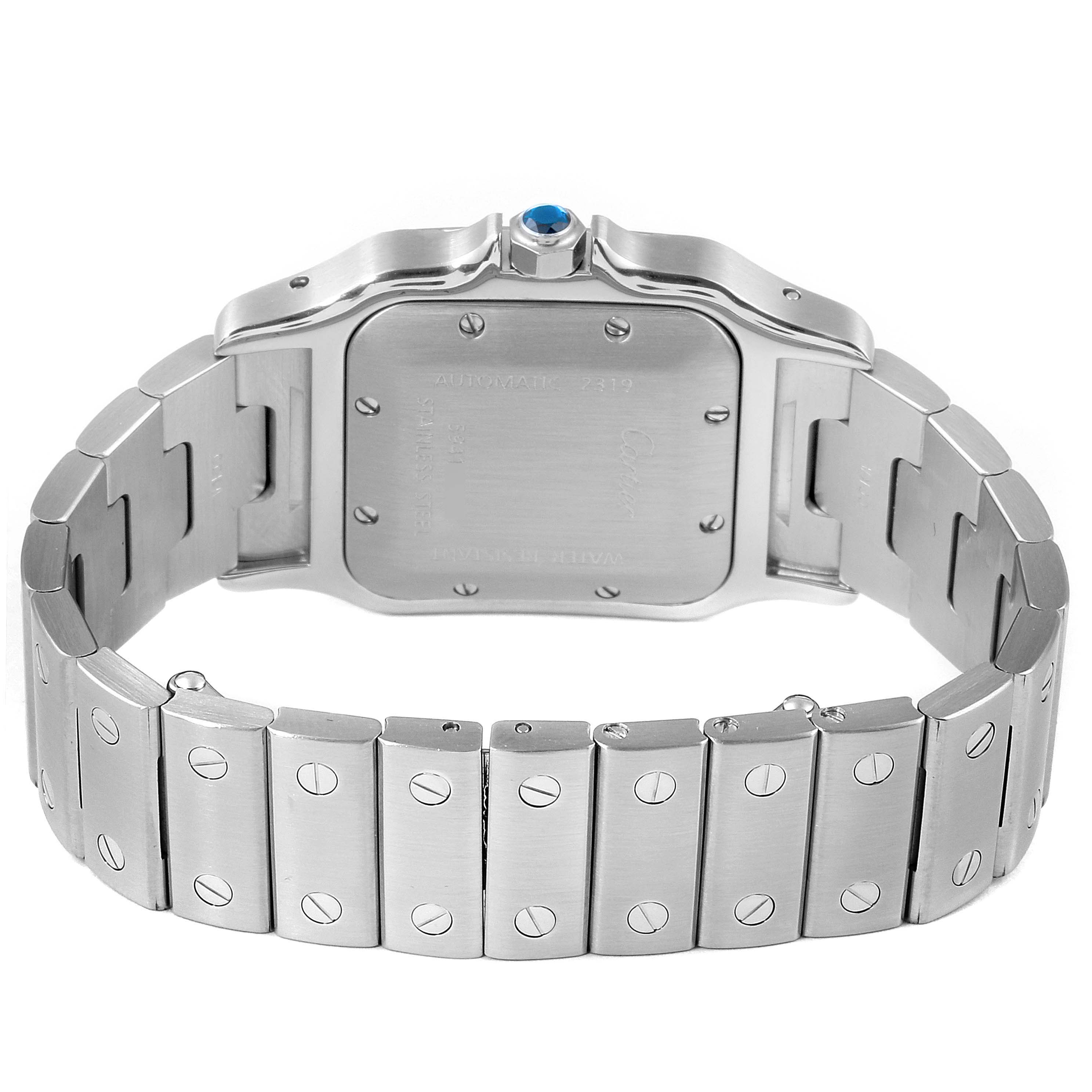 This image shows the back and bracelet of the Cartier Santos W20055D6 Men's Stainless Steel Silver Dial W20055D6 Men's Stainless Steel Silver Dial watch, highlighting the screw details and blue cabochon crown.