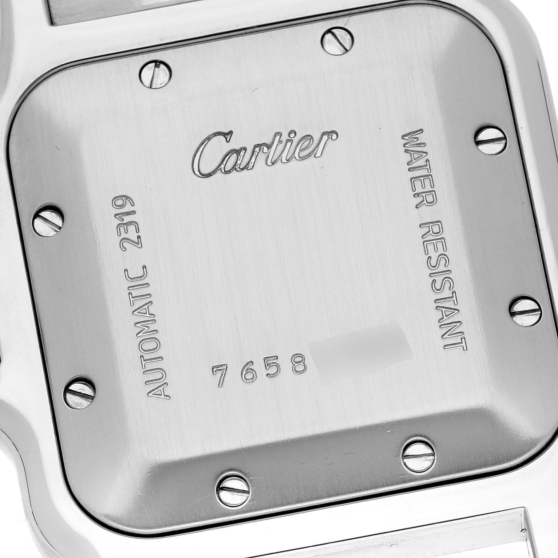 The image shows the back case of a Cartier Santos W20058C4 Men
s Steel and Gold (two tone) Silver Dial W20058C4 Men
s Steel and Gold (two tone) Silver Dial watch, highlighting the brand, model details, and screws.