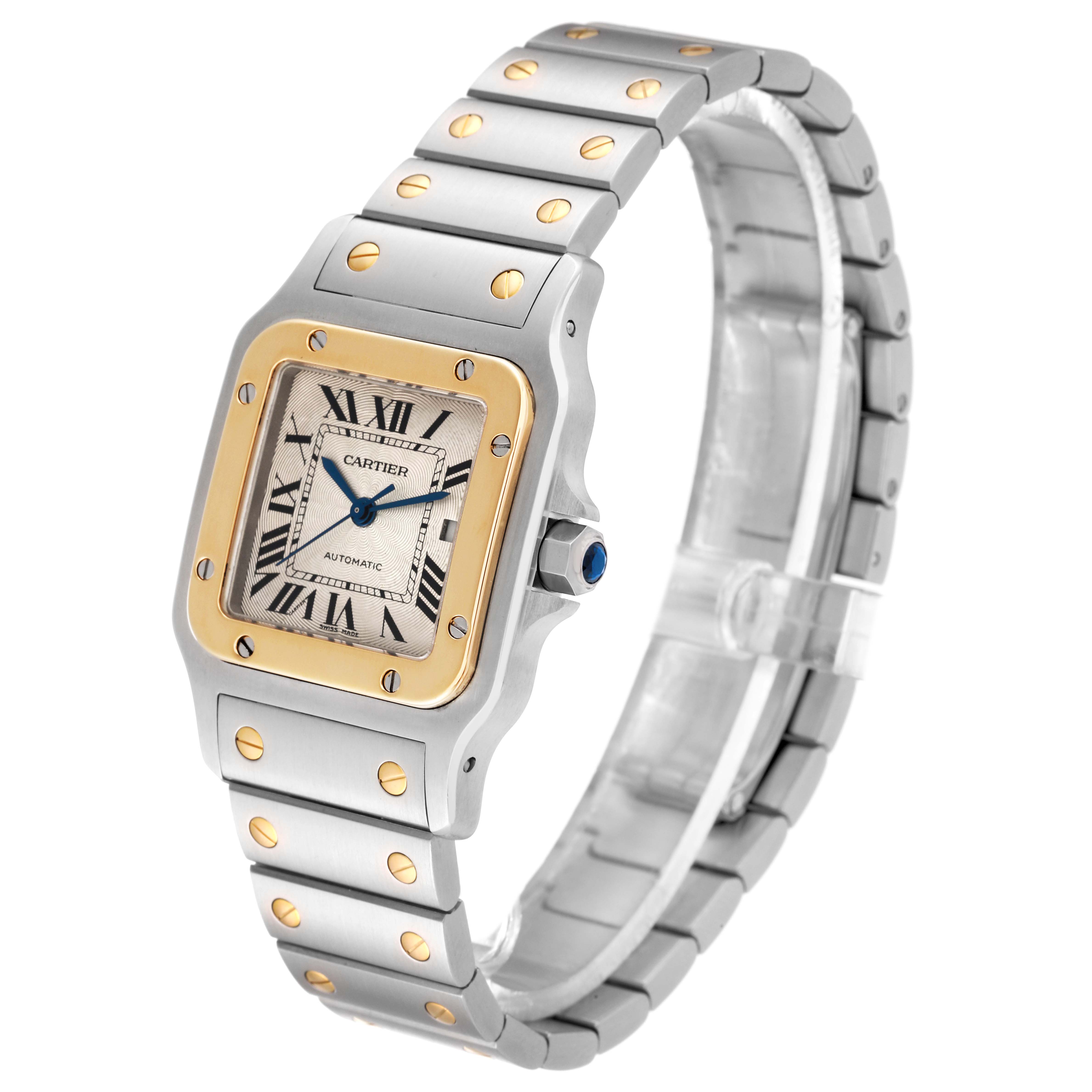 The image shows a Cartier Santos W20058C4 Men
s Steel and Gold (two tone) Silver Dial W20058C4 Men
s Steel and Gold (two tone) Silver Dial watch at an oblique angle, highlighting its face, bezel, crown, and bracelet.