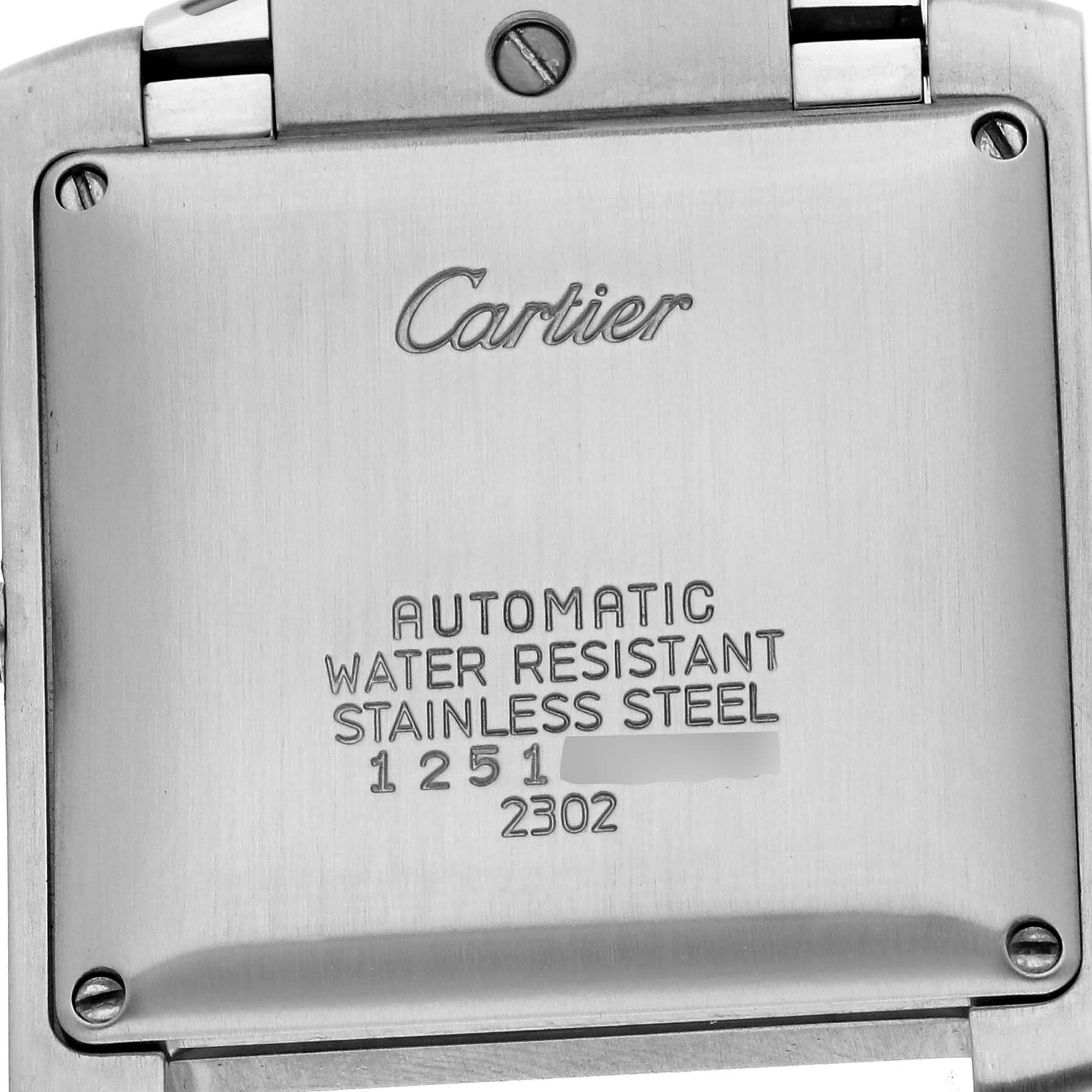 The image shows the back casing of a Cartier Tank Française watch, highlighting engravings and screws.