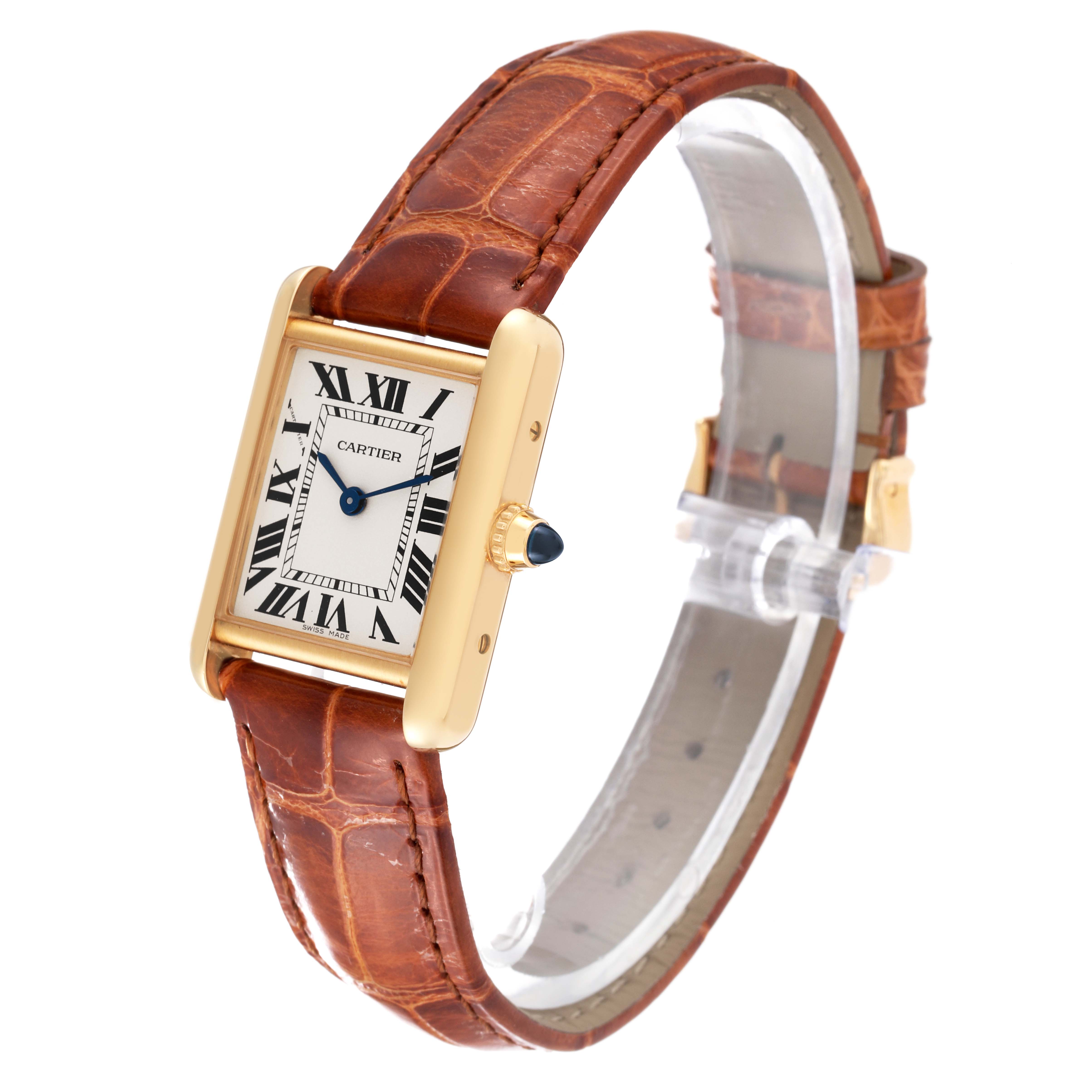 The watch is a Cartier Tank Louis W1529856 Women's Yellow Gold Silver Dial W1529856 Women's Yellow Gold Silver Dial model, shown at an oblique angle, displaying its face, strap, and crown.