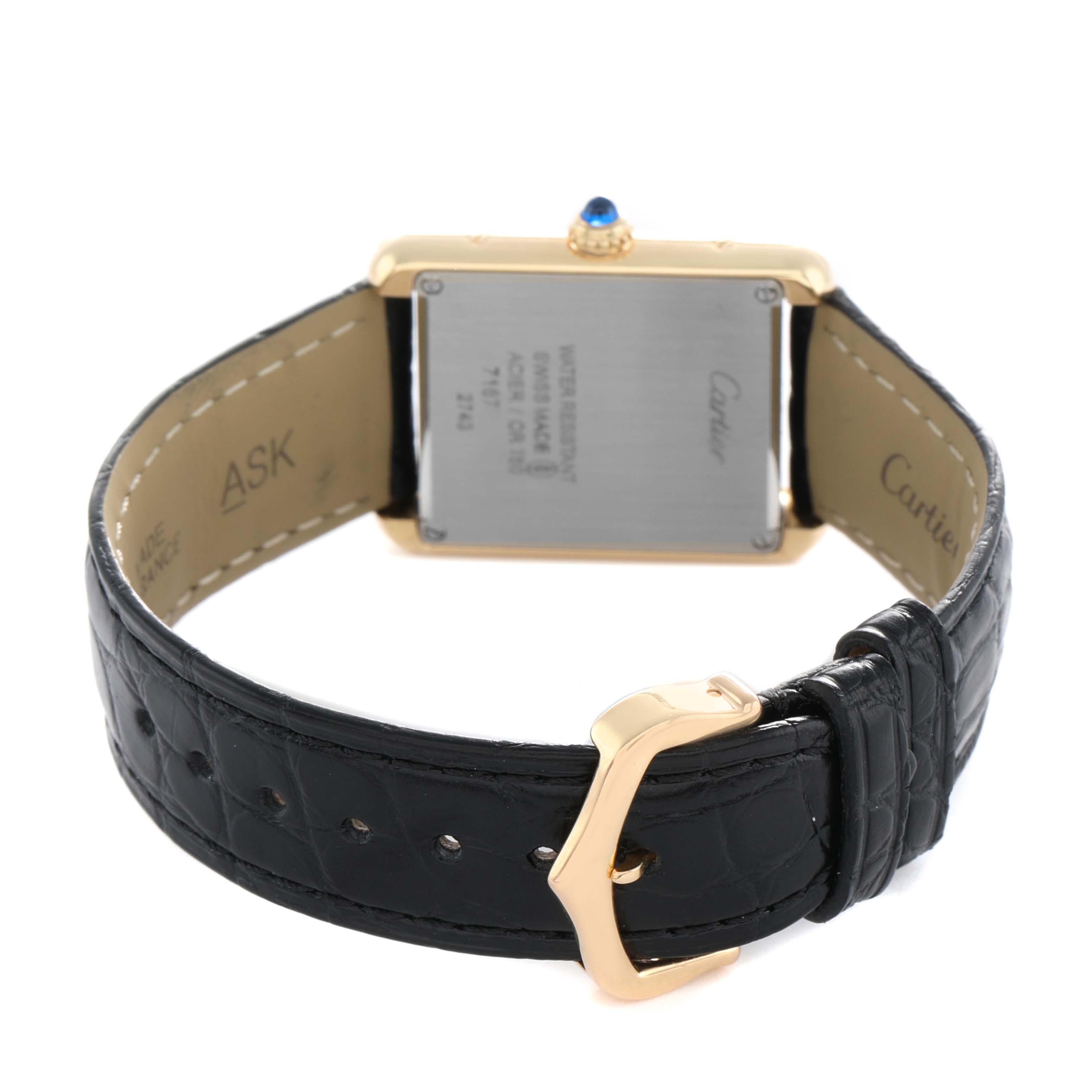 The image shows the back of a Cartier Tank Solo W1018755 Women's Yellow Gold Silver Dial watch, featuring the case back, strap, and buckle.