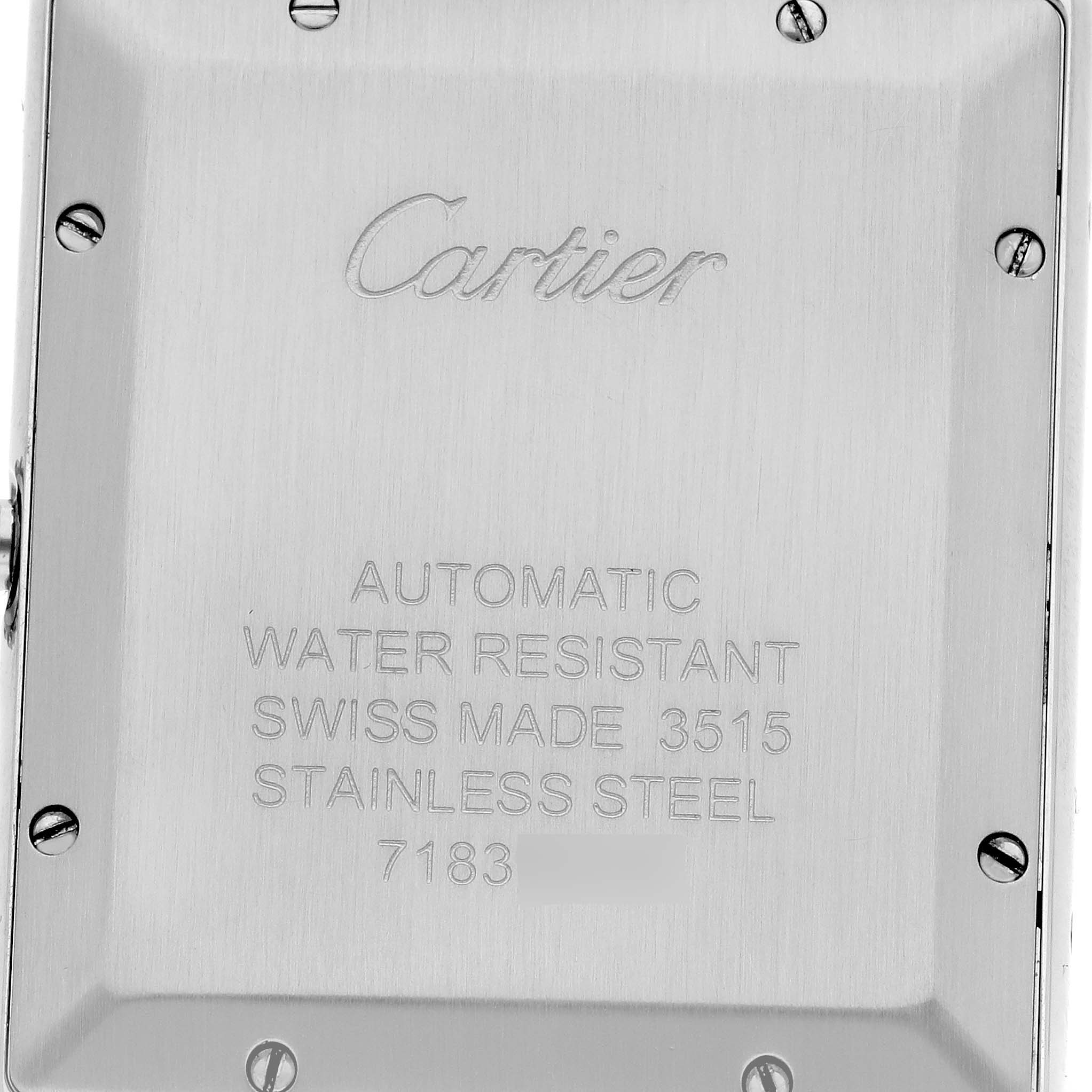 The image shows the back case of a Cartier Tank Solo W5200027 Men's Stainless Steel Silver Dial W5200027 Men's Stainless Steel Silver Dial watch, featuring engravings and screws.
