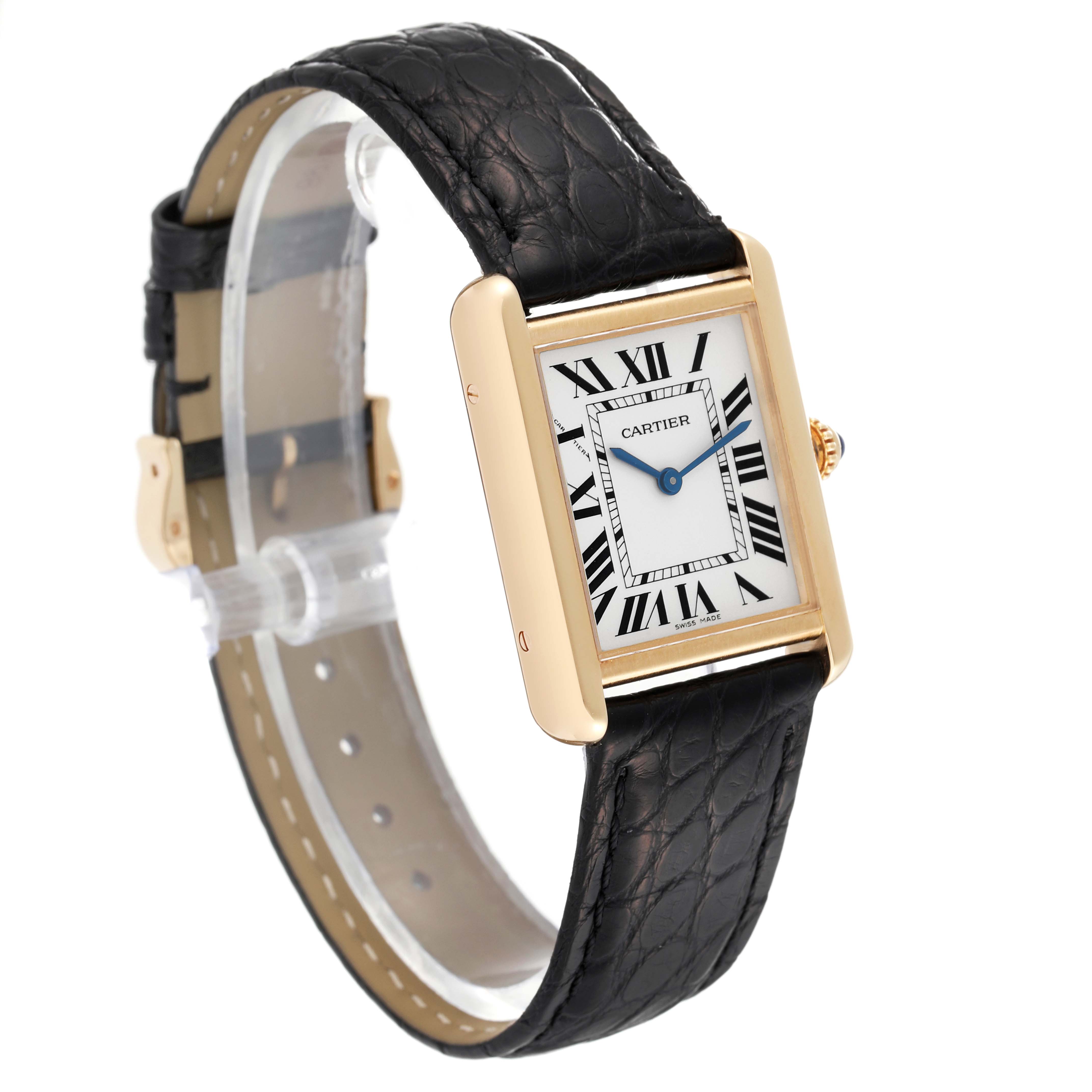 This Cartier Tank Solo W5200002 Women
s Steel and Gold (two tone) Silver Dial W5200002 Women
s Steel and Gold (two tone) Silver Dial watch is shown at a slight angle, highlighting its rectangular face, blue hands, Roman numerals, and leather strap.