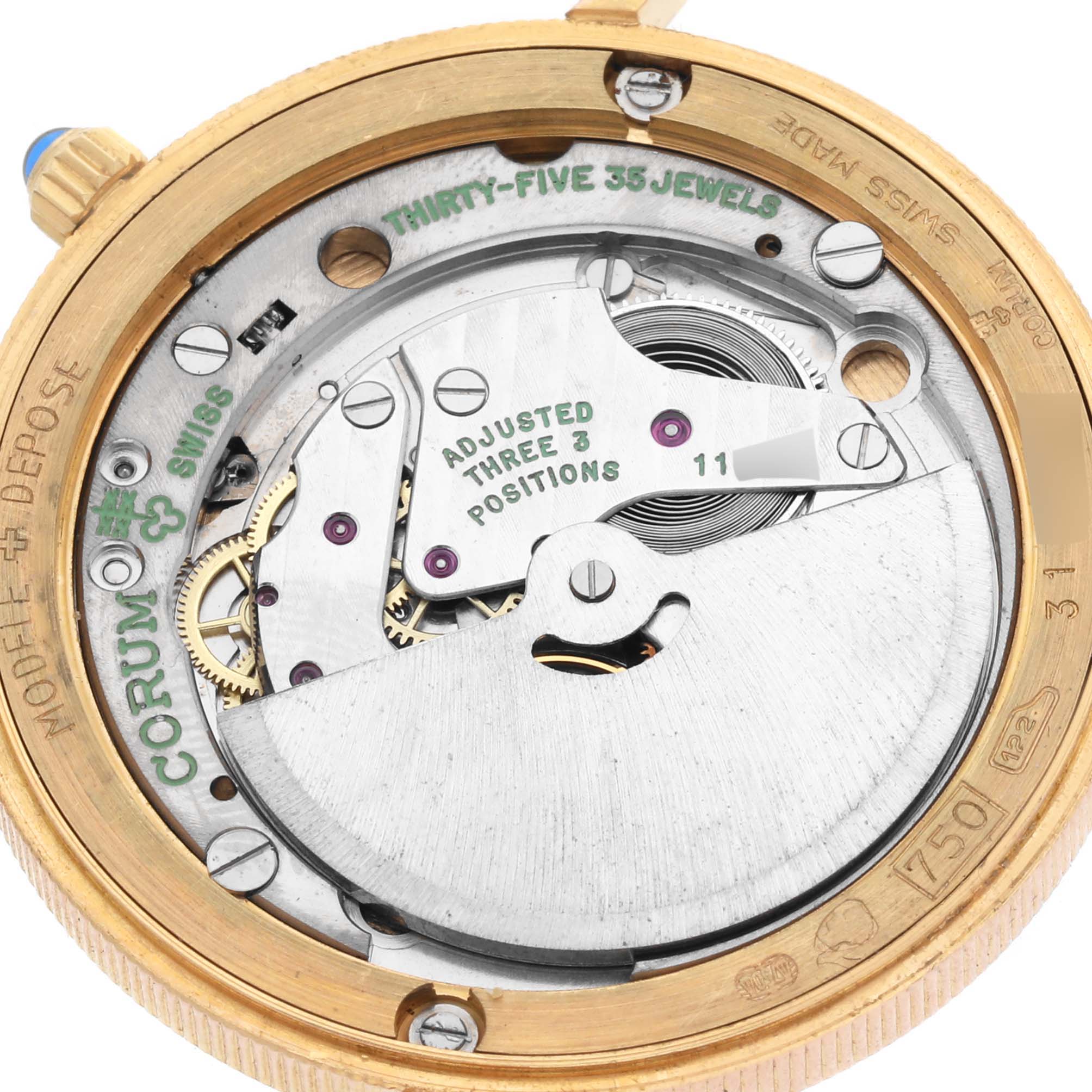 The image shows the back view of the Corum Coin Watch Men's Yellow Gold Champagne Dial Men's Yellow Gold Champagne Dial, highlighting its internal mechanical parts.