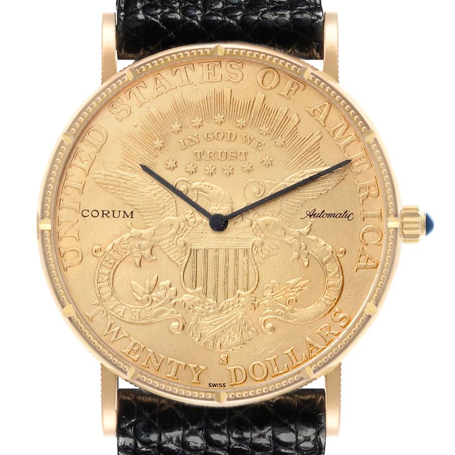 The Coin Watch model by Corum is shown from the front, displaying its intricate gold dial and black strap.