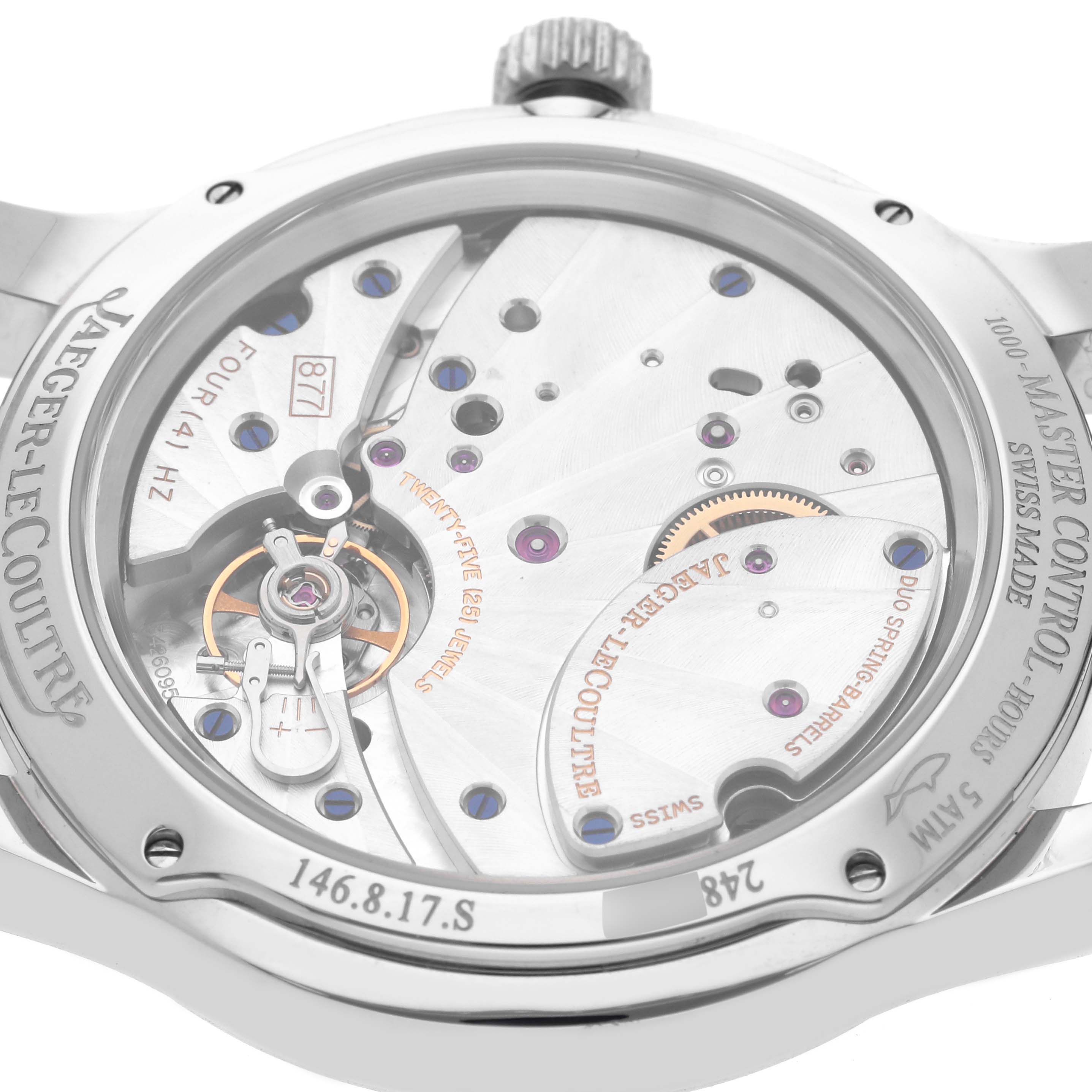 The image shows the back of a Jaeger-LeCoultre Master watch, highlighting the movement and intricate mechanics.