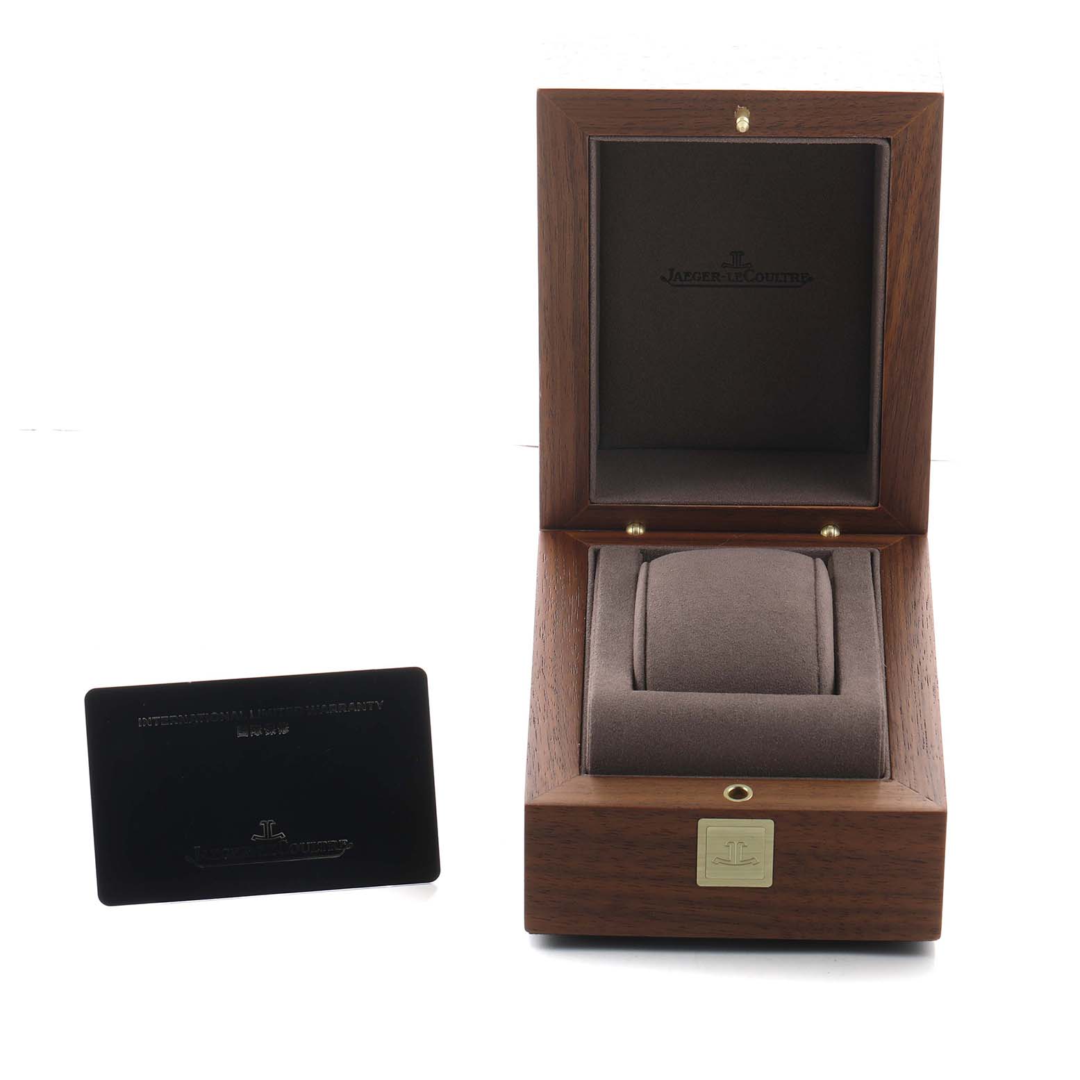 The image shows an open Jaeger LeCoultre Reverso Q2458422 Men's Stainless Steel Silver Dial watch box and a warranty card placed beside it.