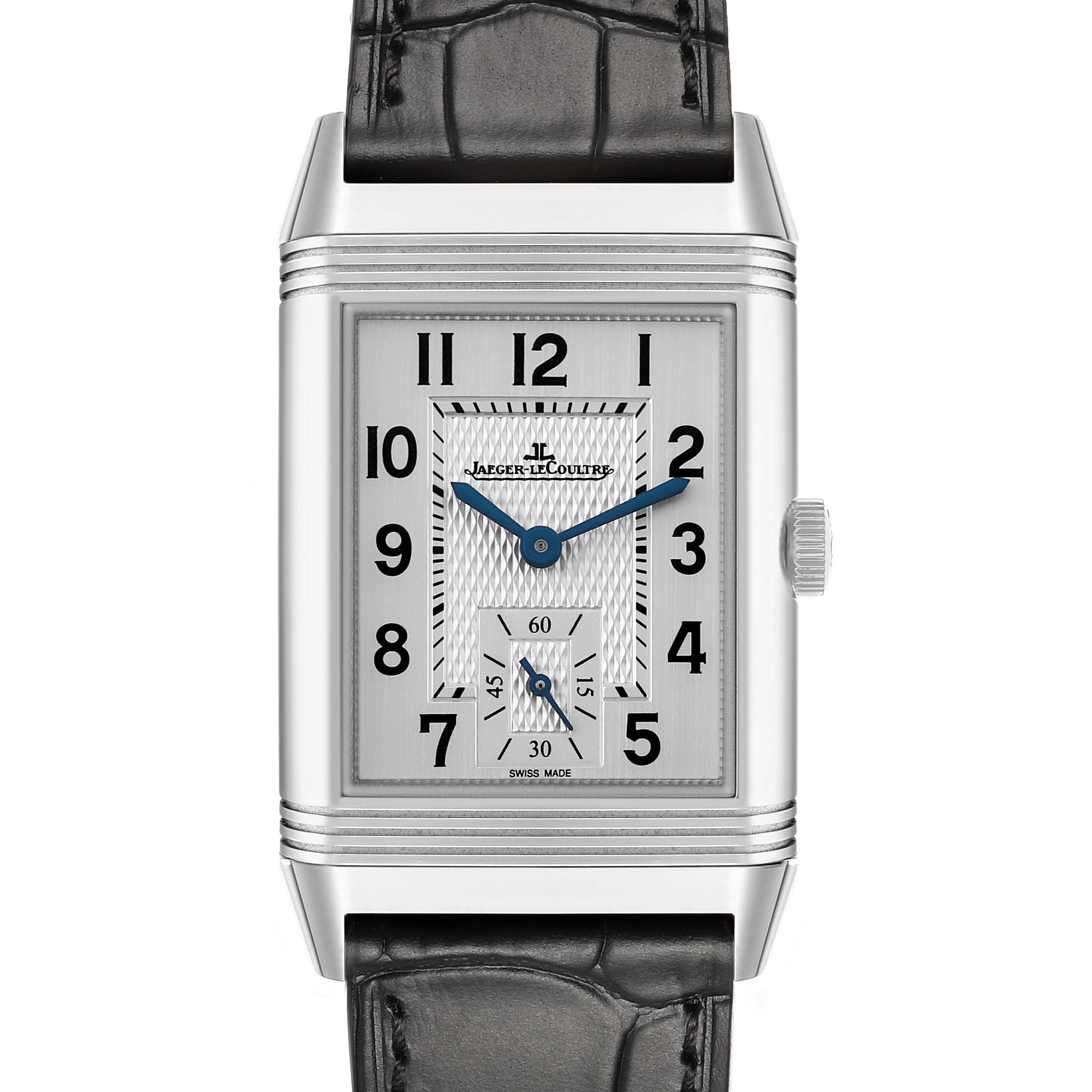 The Jaeger-LeCoultre Reverso watch is shown from a front angle, highlighting the dial, case, and strap.