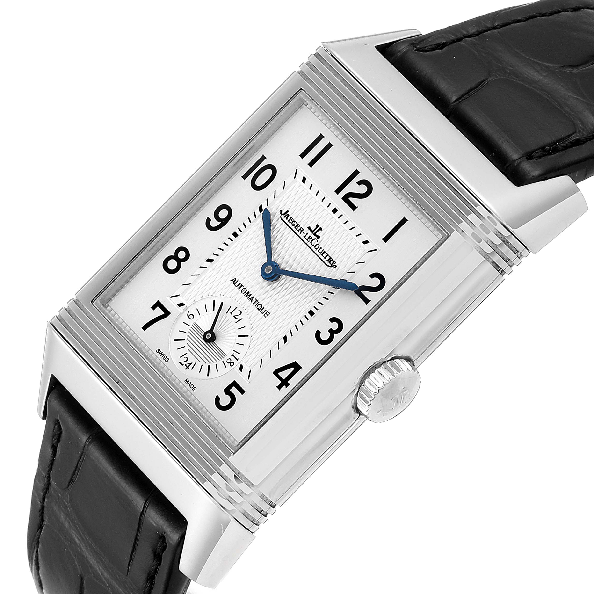 The image shows a close-up of the watch face, crown, and strap of a Jaeger-LeCoultre Reverso model at a tilted angle.