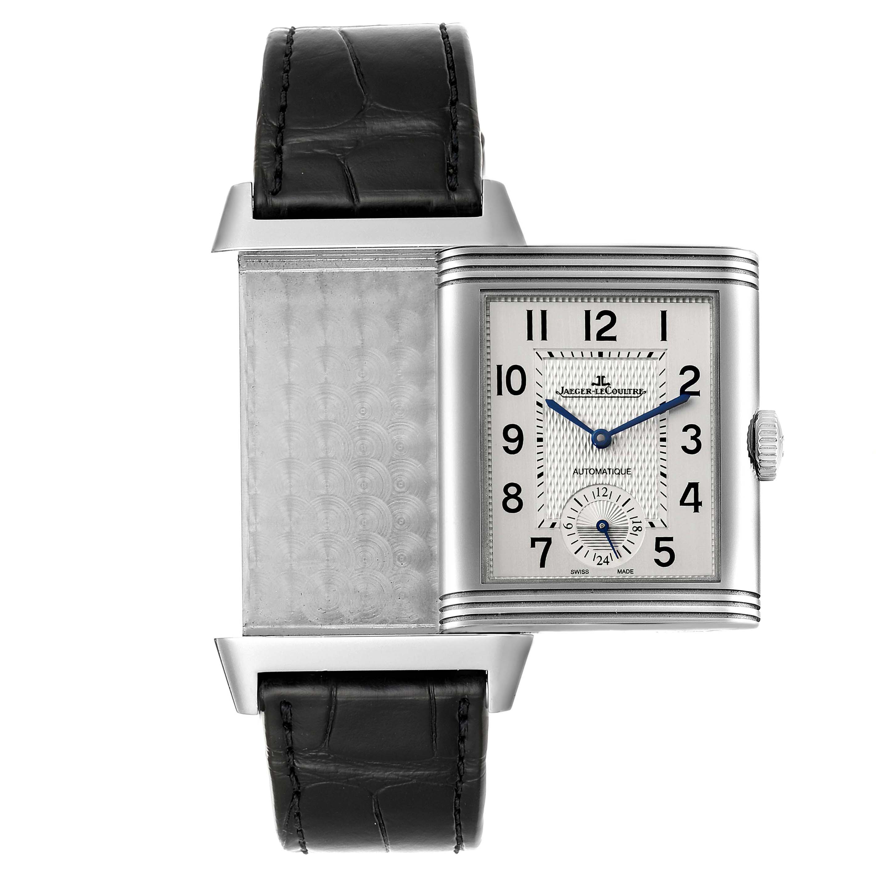The image shows a Jaeger LeCoultre Reverso Q3838420 Men
s Stainless Steel Silver Dial Q3838420 Men
s Stainless Steel Silver Dial watch at an angle revealing both the front face and the back side.