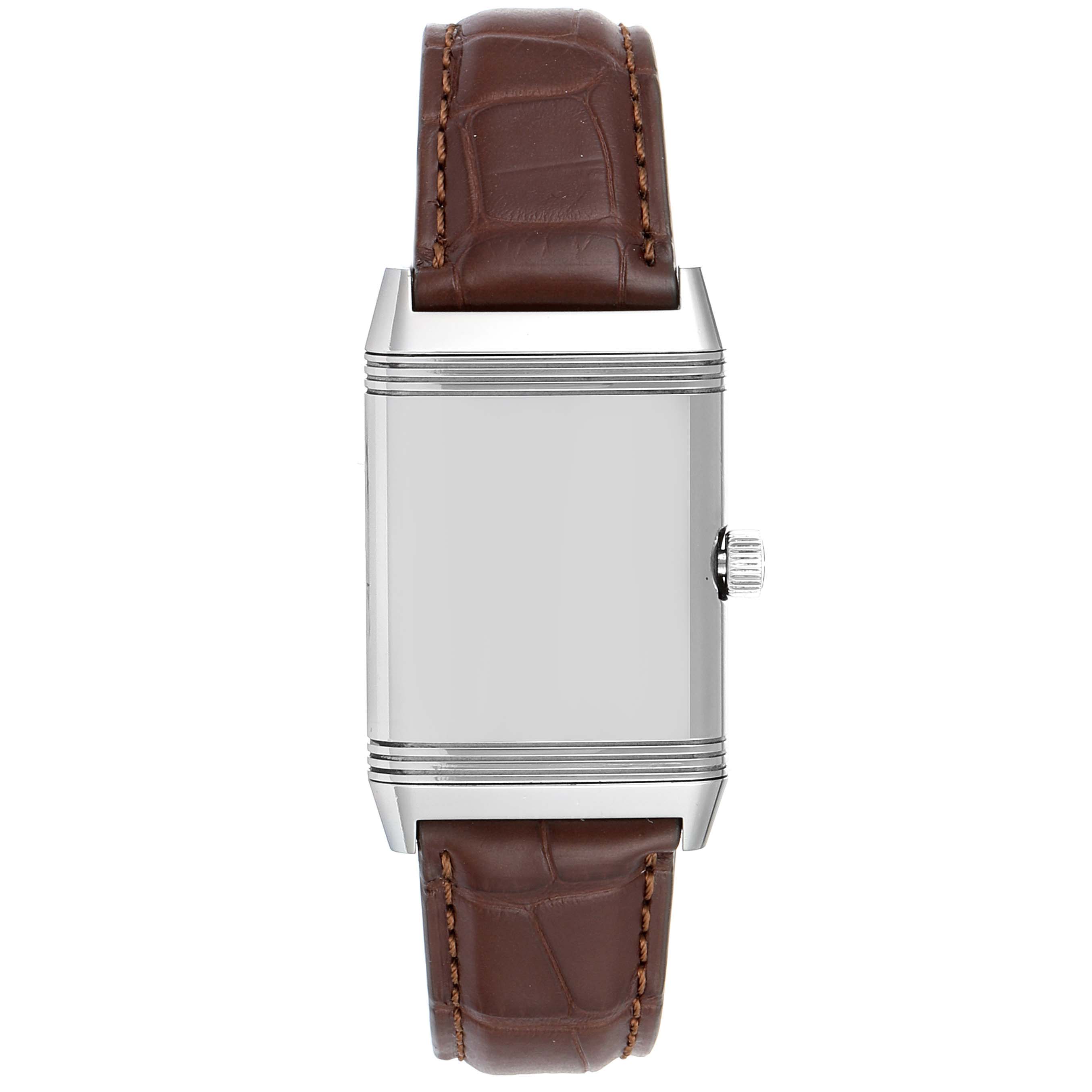 The image shows a front view of the Jaeger LeCoultre Reverso Q3858520 Men
s Stainless Steel Silver Dial Q3858520 Men
s Stainless Steel Silver Dial watch with a brown leather strap and a silver case.