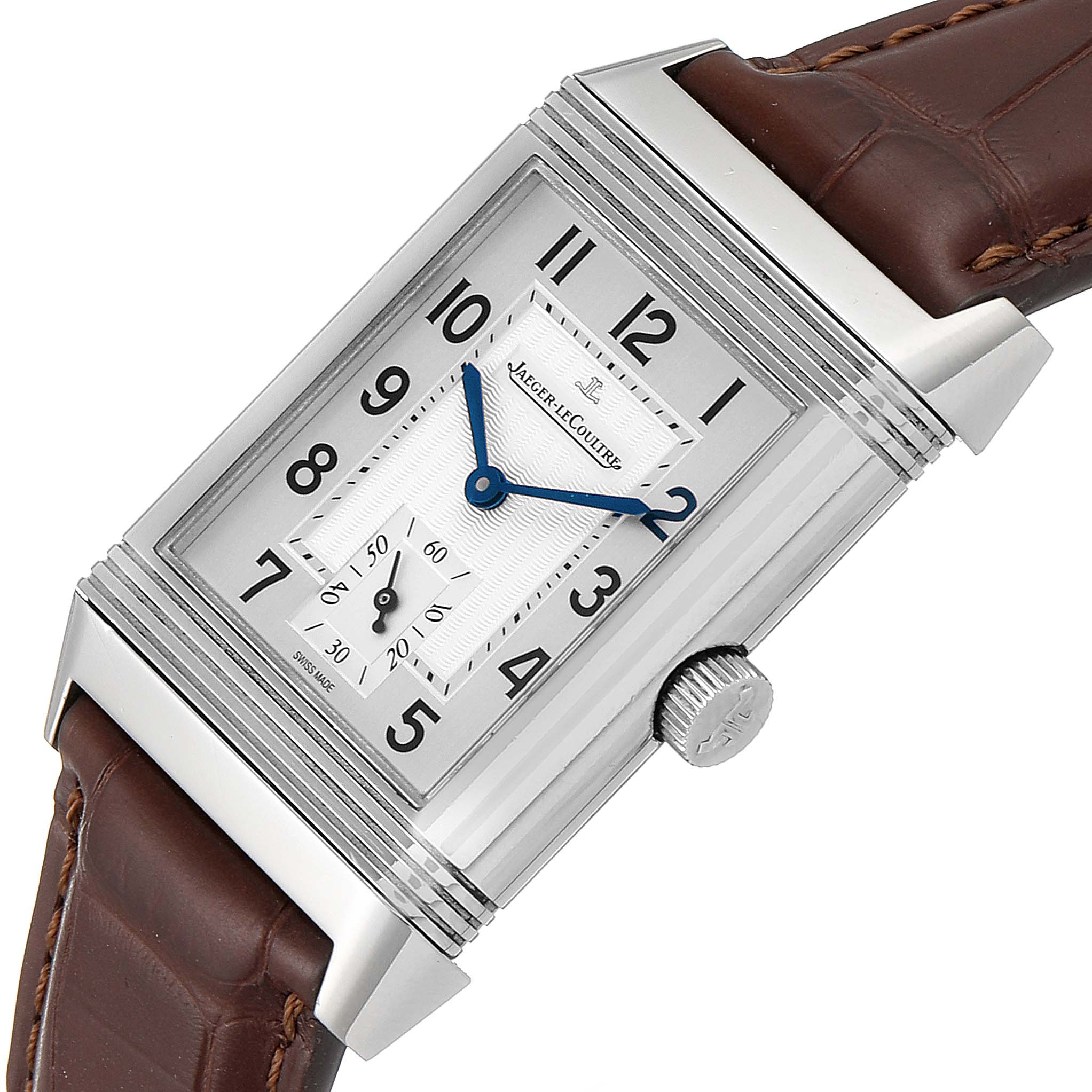 The angle shows the face and crown of the Jaeger LeCoultre Reverso Q3858520 Men
s Stainless Steel Silver Dial Q3858520 Men
s Stainless Steel Silver Dial watch with a brown leather strap.
