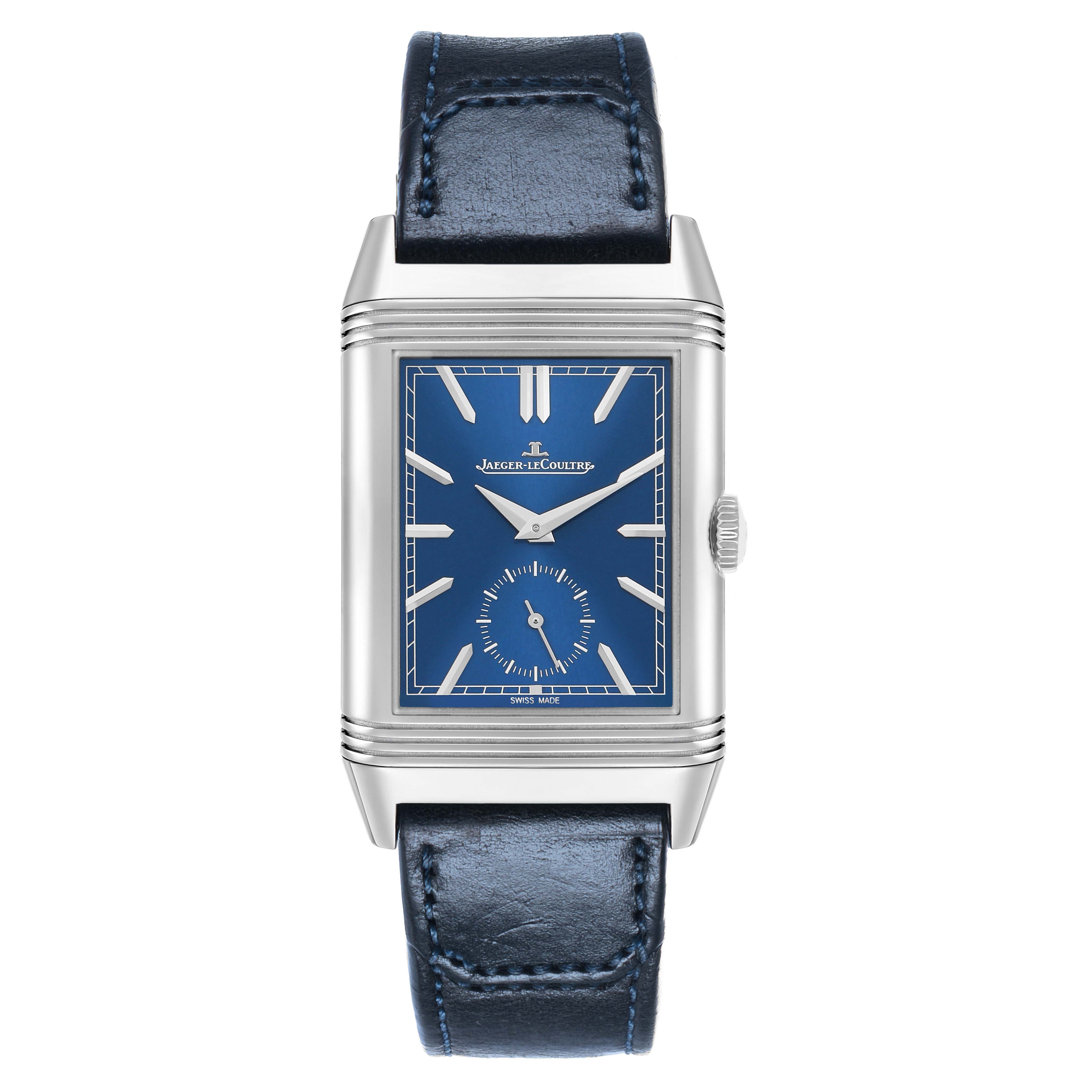 The Jaeger-LeCoultre Reverso model is shown from a front angle, displaying its blue dial, rectangular case, and leather strap.