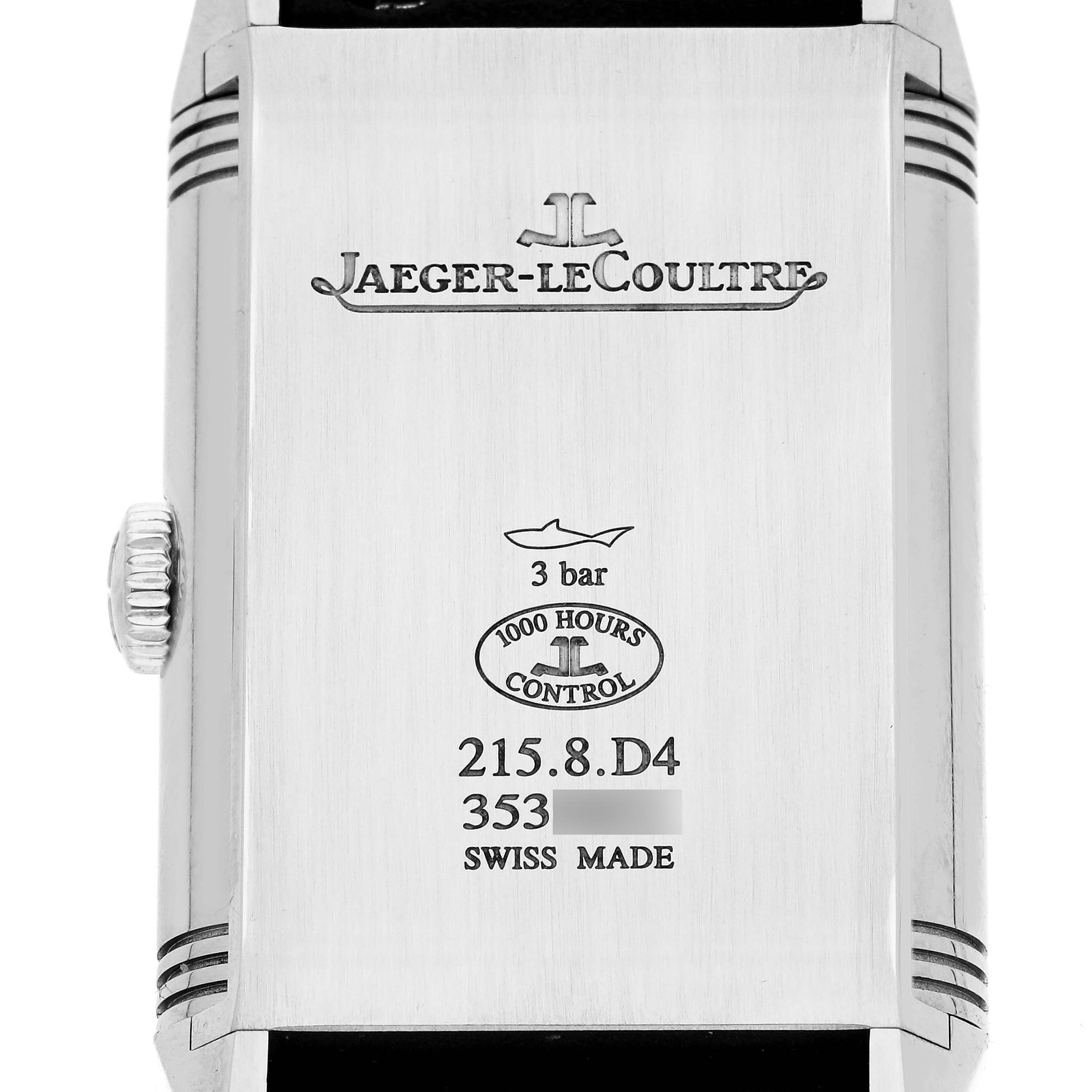 The image shows the back of a Jaeger-LeCoultre Reverso watch, featuring the brand's logo and specifications.