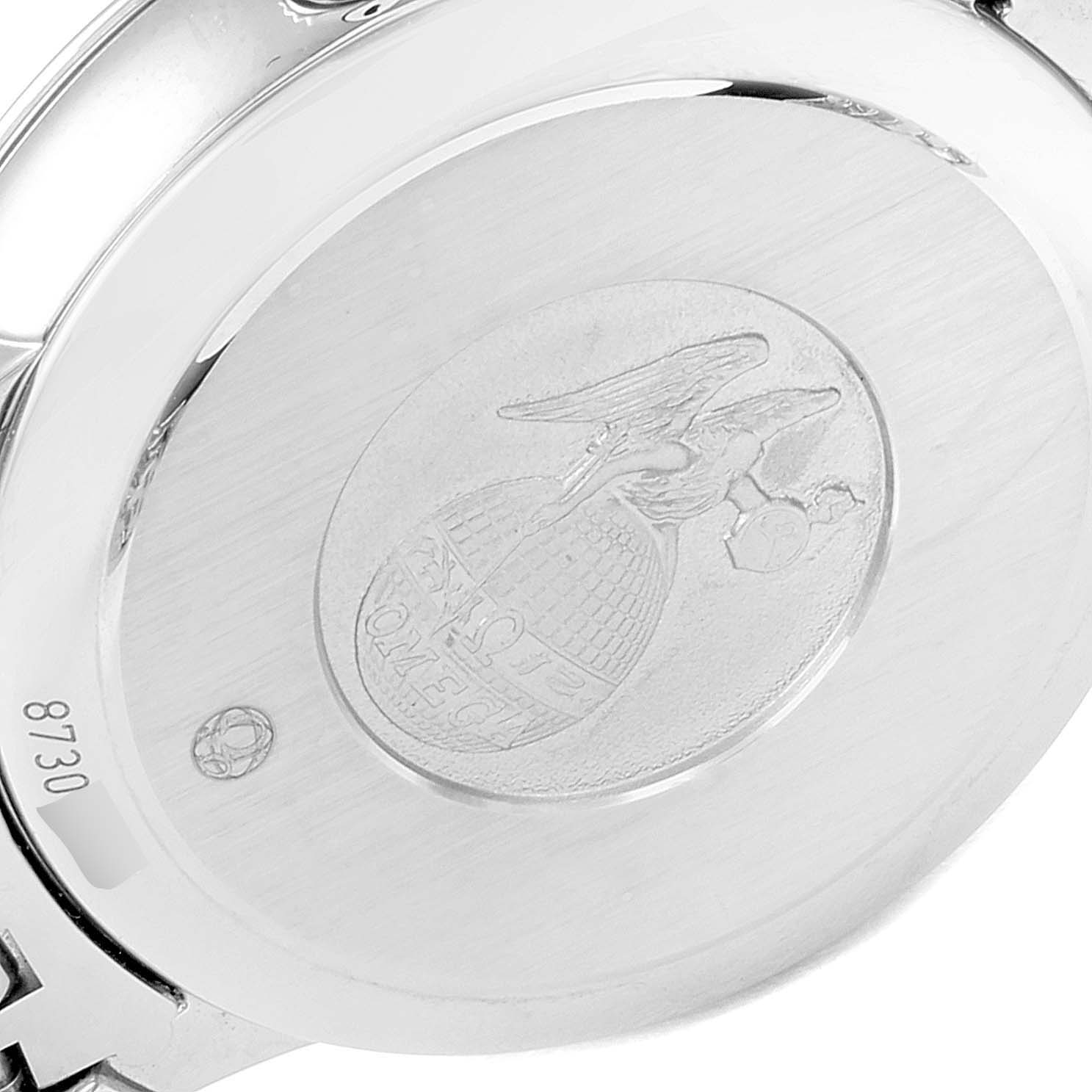 The image shows the back case of the Omega 424.10.33.20.55.001 Women's Stainless Steel Mother of Pearl Dial 424.10.33.20.55.001 Women's Stainless Steel Mother of Pearl Dial DeVille Prestige Butterfly Diamond Watch 424.10.33.20.55.001, highlighting the engraved logo.