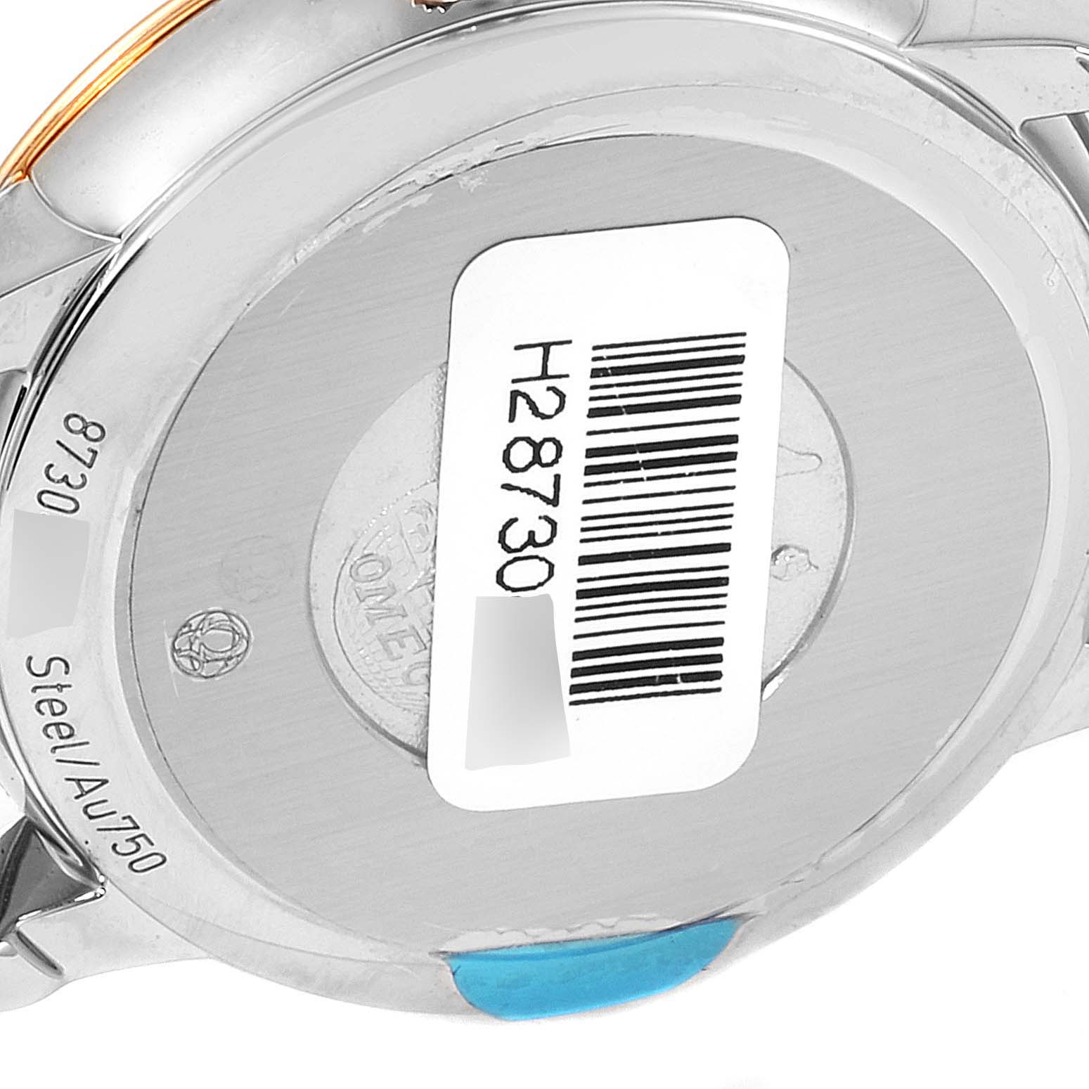 This image shows the case back of the Omega 424.22.33.20.55.001 Women's Steel and Gold (two tone) Mother of Pearl Dial 424.22.33.20.55.001 Women's Steel and Gold (two tone) Mother of Pearl Dial DeVille Prestige Butterfly Diamond Watch 424.22.33.20.55.001 Unworn model at an angled view.