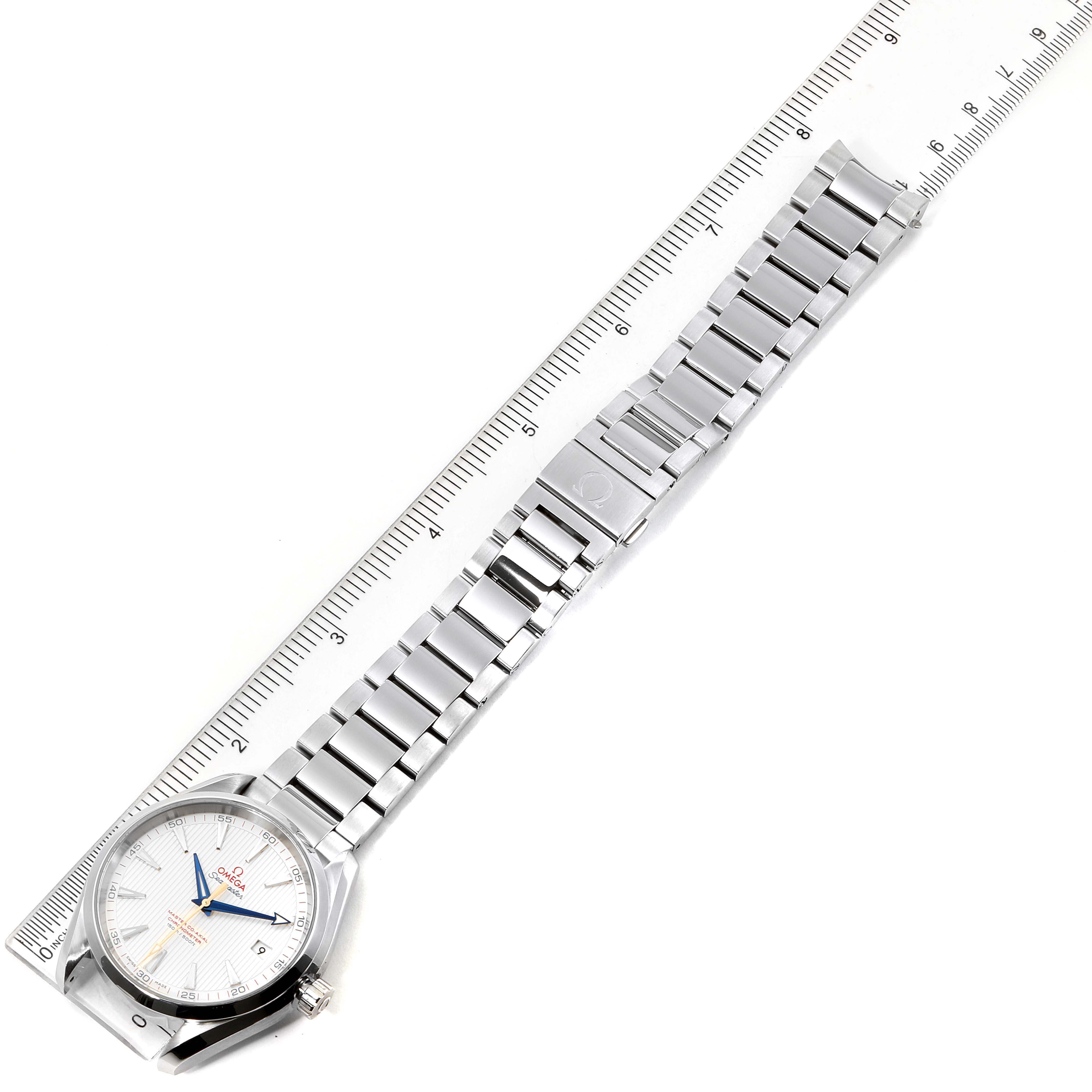 The image shows an Omega Aqua Terra 231.10.42.21.02.004 Men's Stainless Steel Silver Dial 231.10.42.21.02.004 Men's Stainless Steel Silver Dial watch laid out flat with a ruler measuring its length, displaying both the face and entire bracelet.