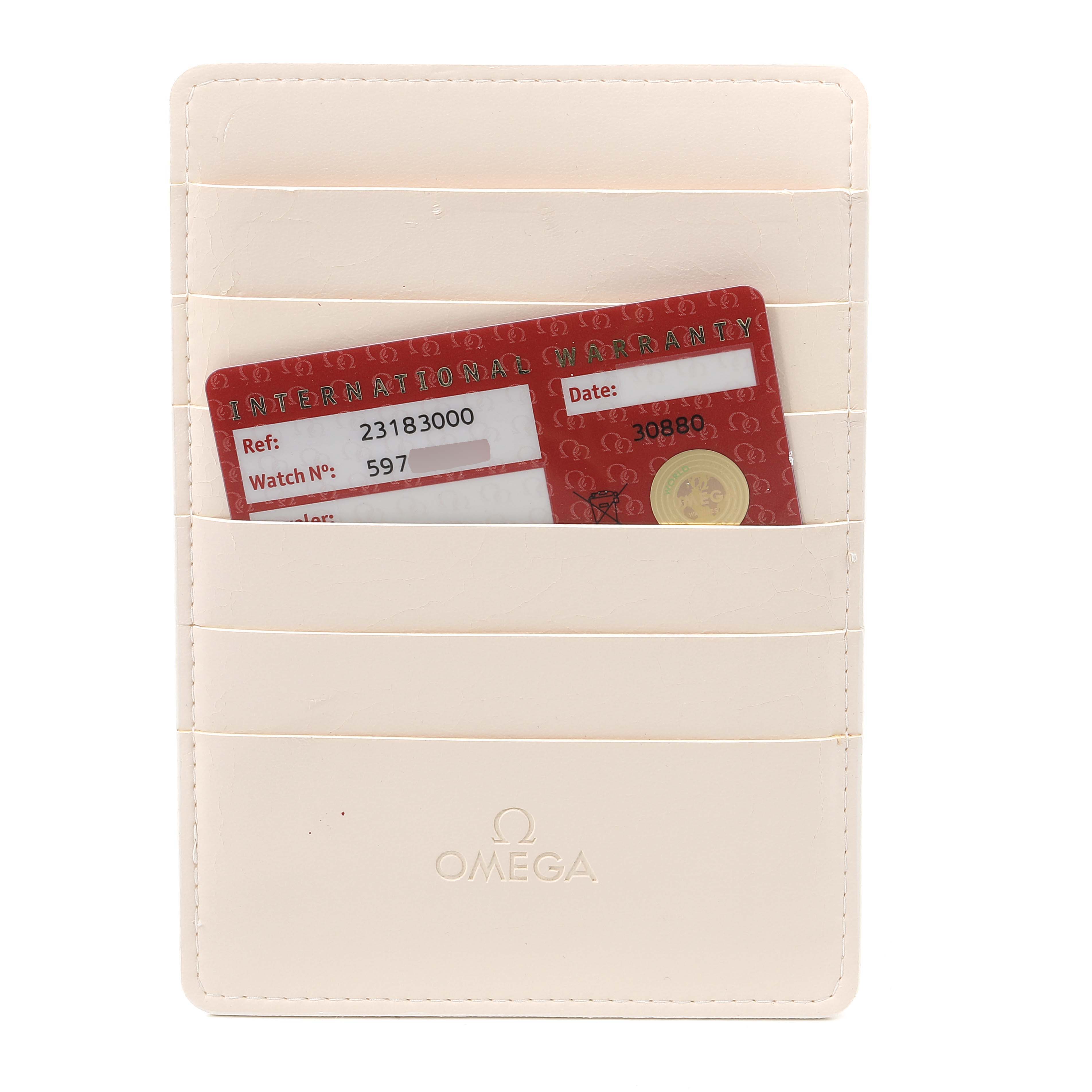 This image shows the Omega Aqua Terra 2318.30.00 Men's Steel and Gold (two tone) Silver Dial 2318.30.00 Men's Steel and Gold (two tone) Silver Dial model's warranty card and a cream-colored cardholder.